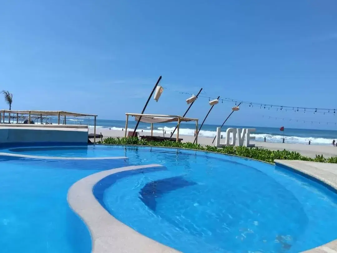 Swimming Pool in Mishol Bodas Hotel & Beach Club Privado