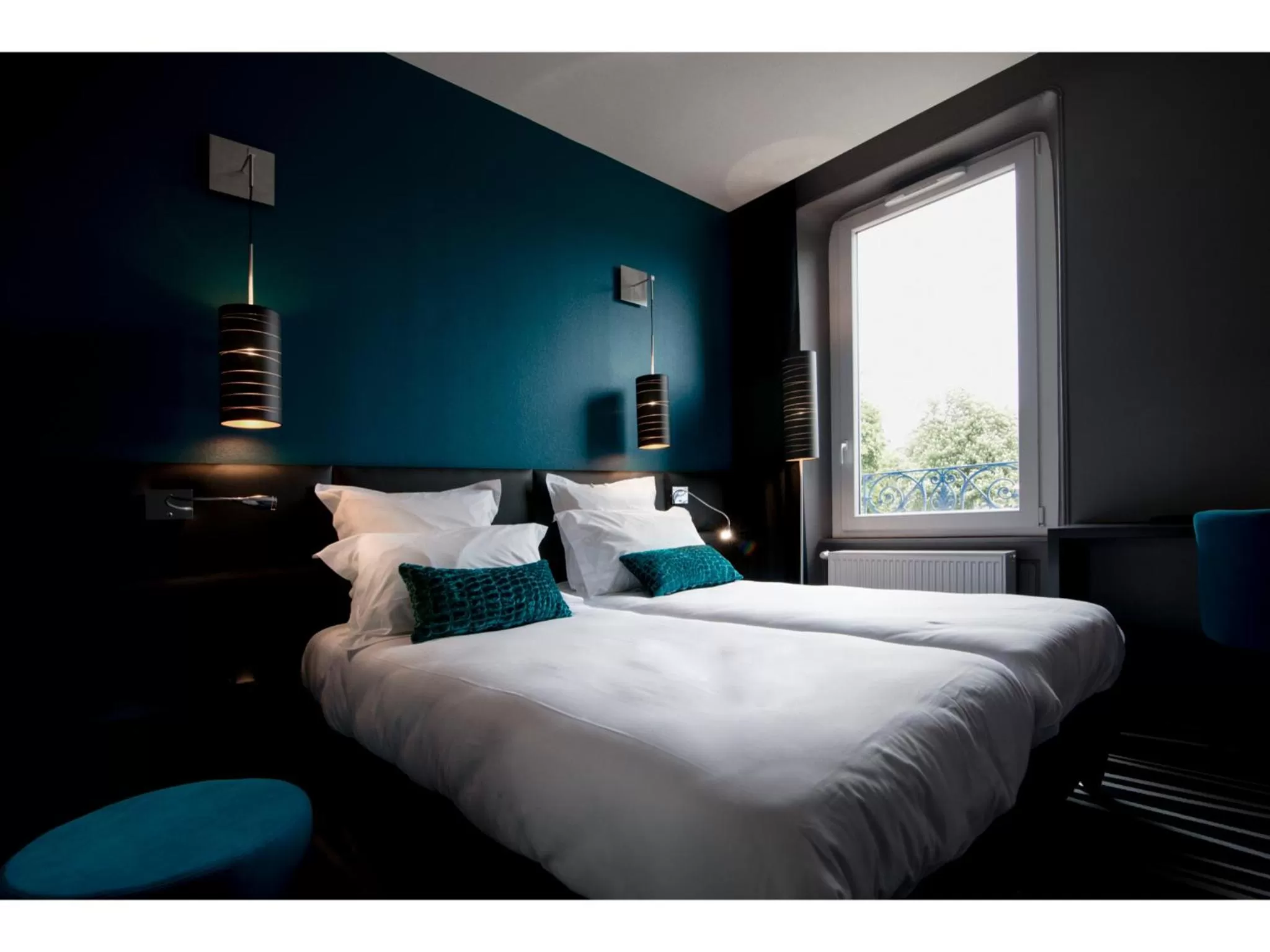 Bed in Hotel Restaurant Les Capucins