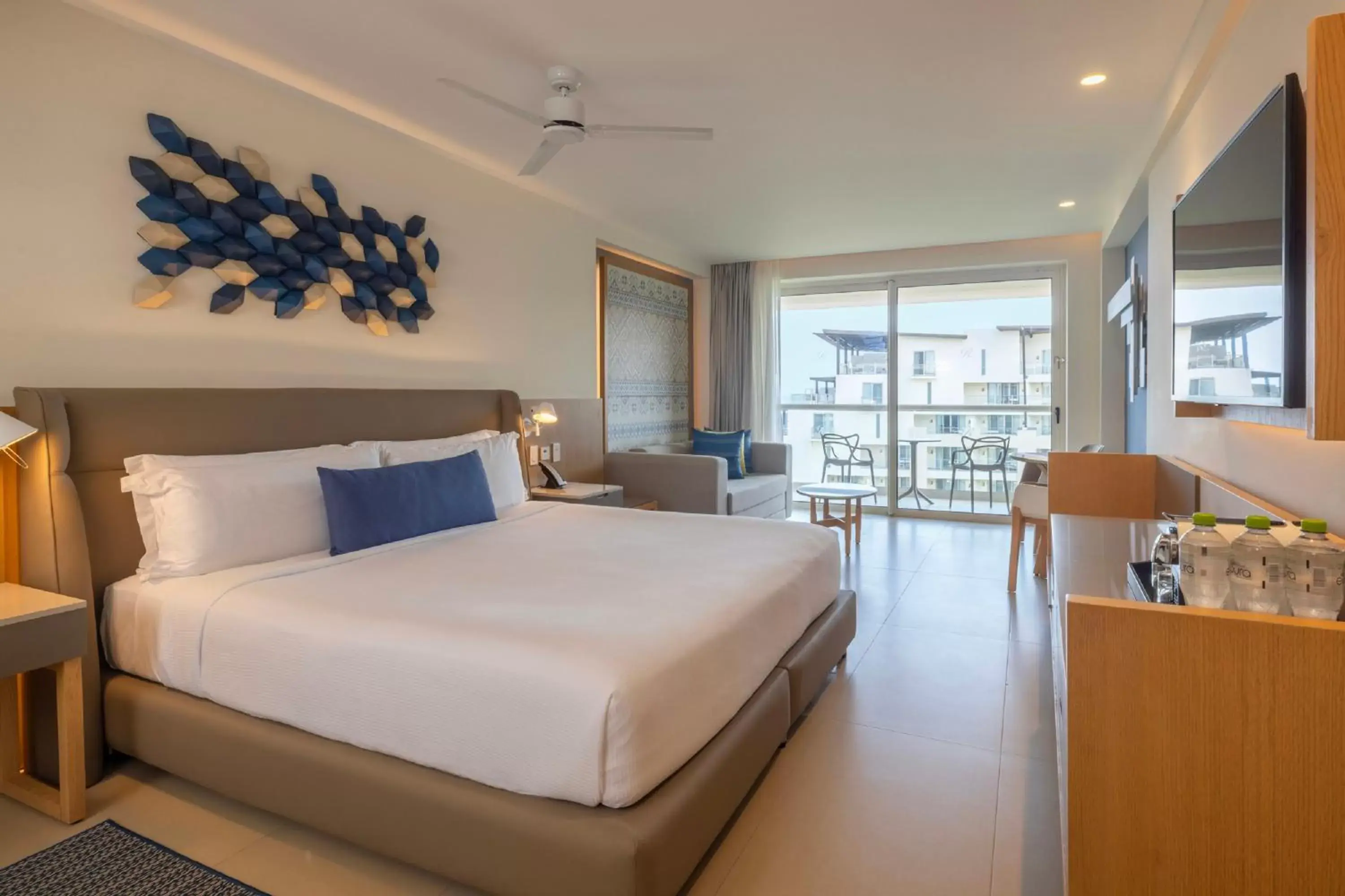 Bed in Royalton Splash Riviera Cancun, An Autograph Collection All-Inclusive Resort