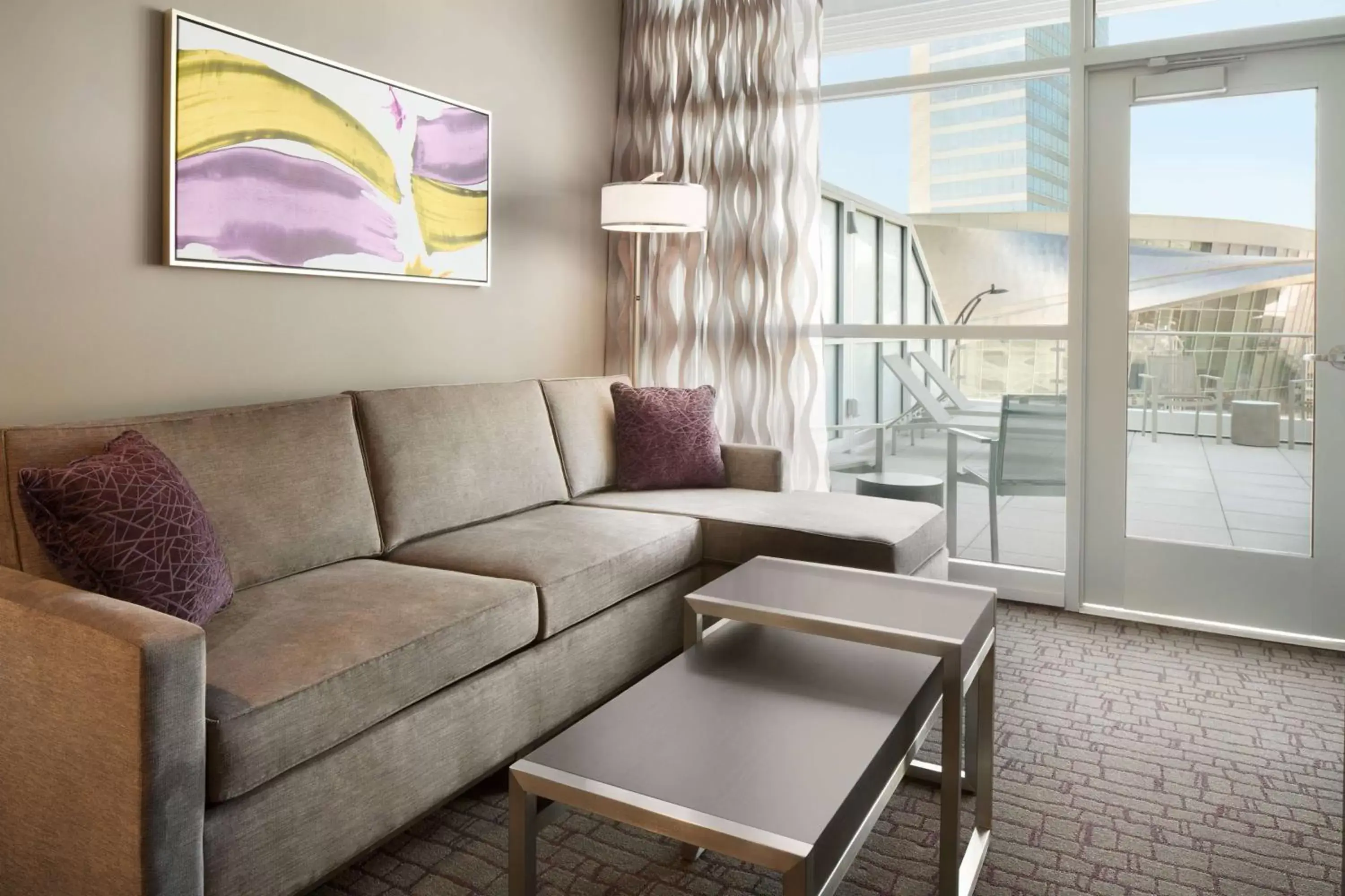 Living room, Seating Area in Embassy Suites by Hilton Charlotte Uptown