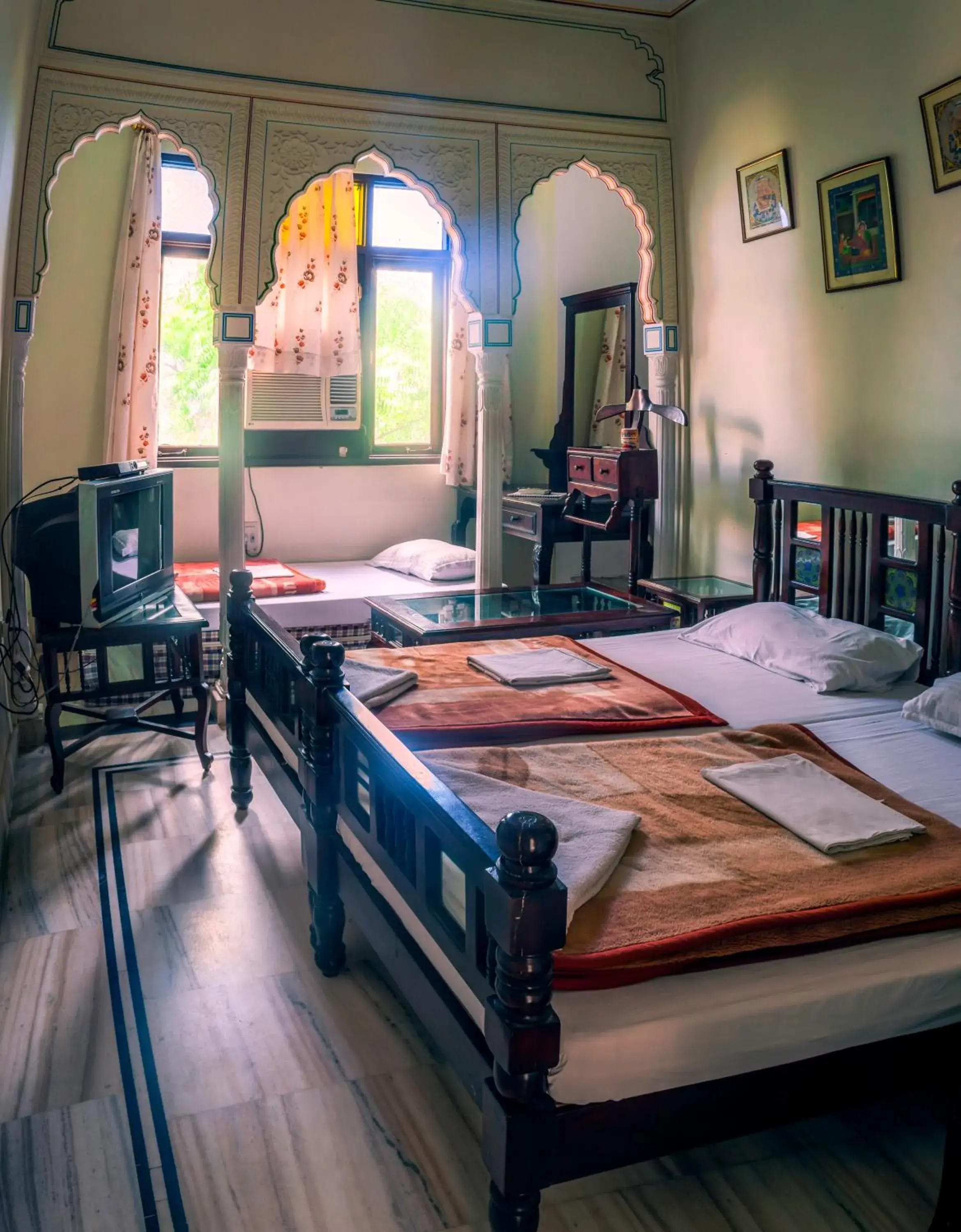 Bed in Krishna Palace - A Heritage Hotel