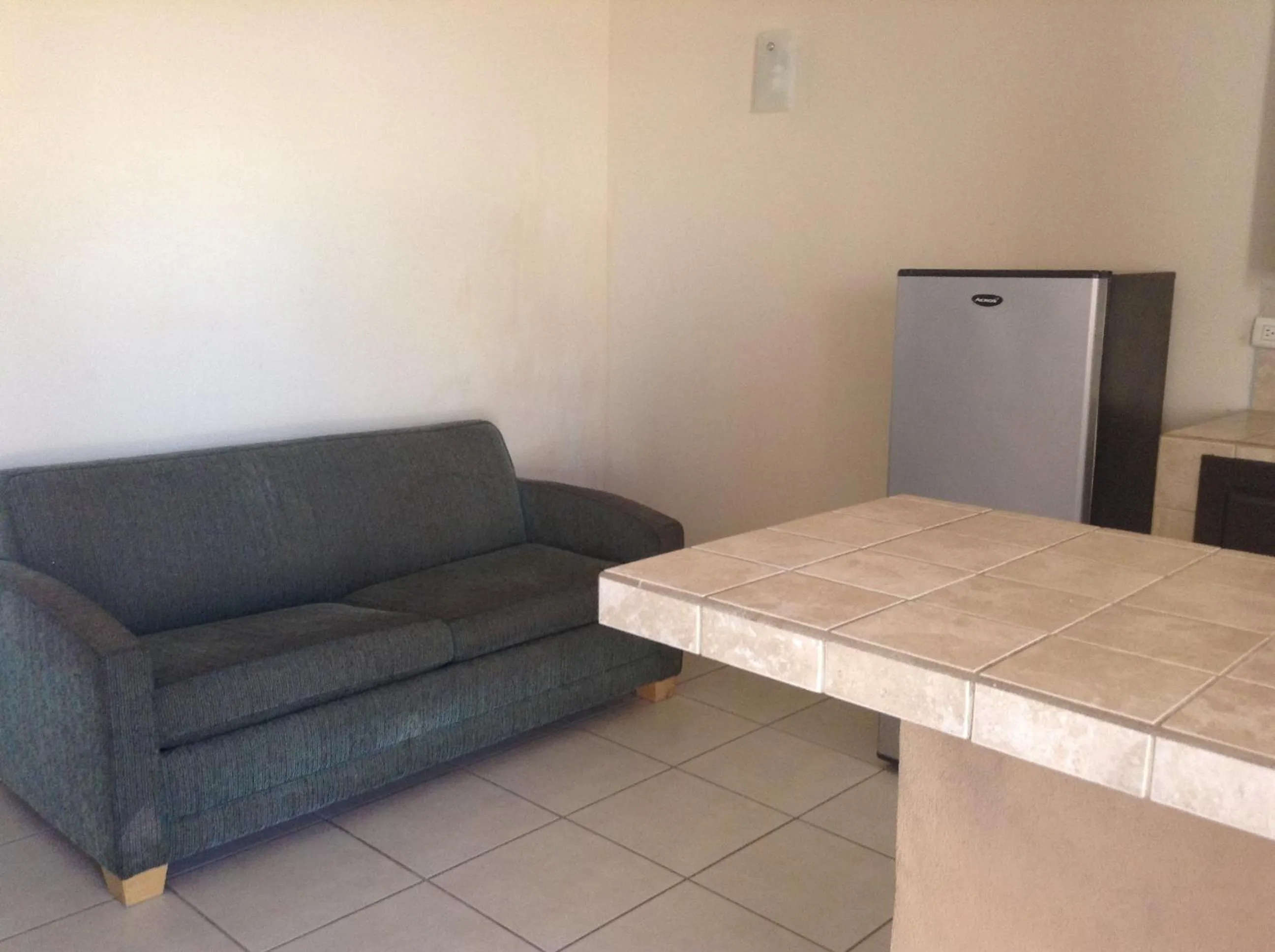 Living room in Los Jitos Hotel & Suites