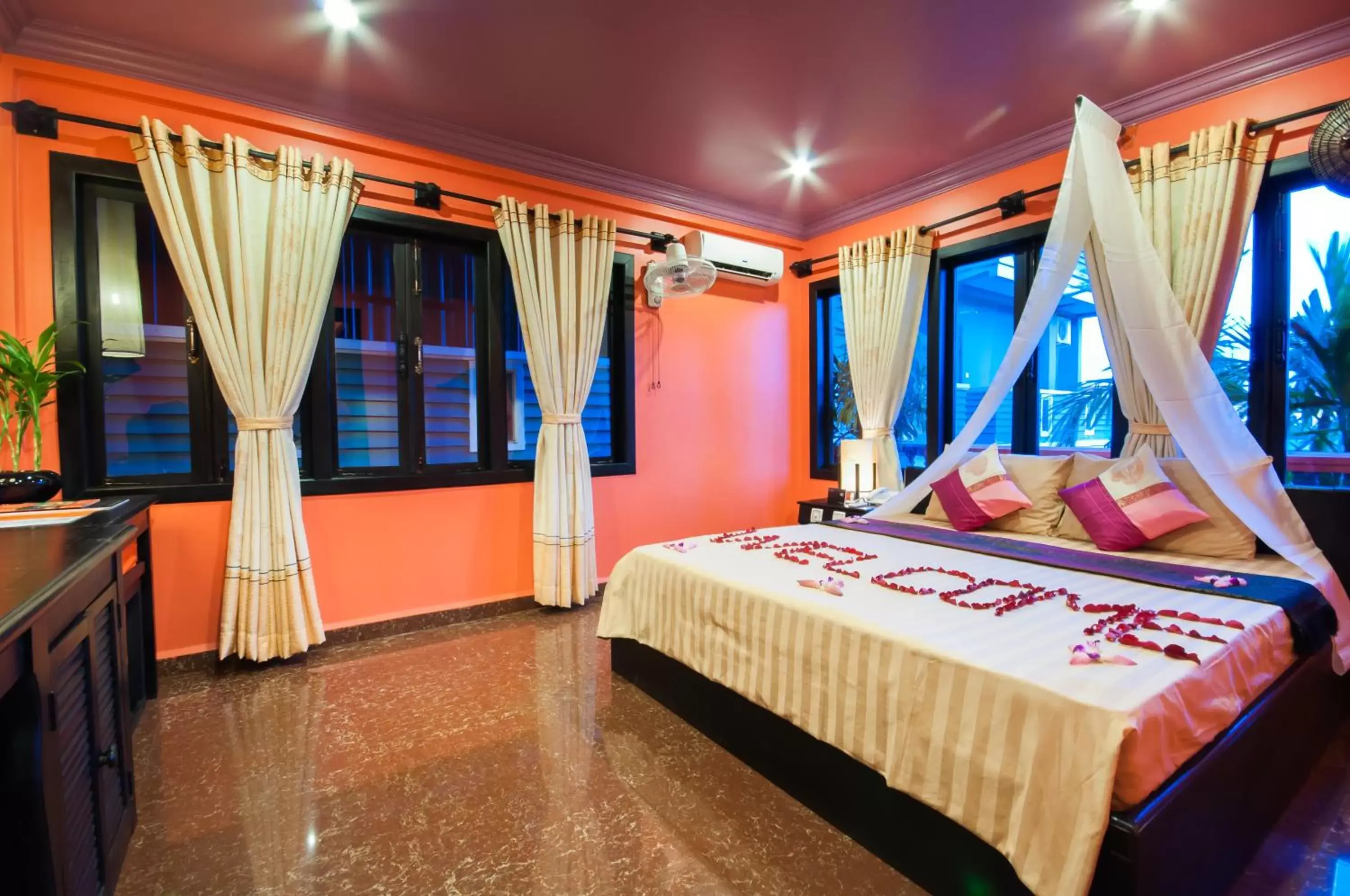 Bed in Golden Butterfly Villa