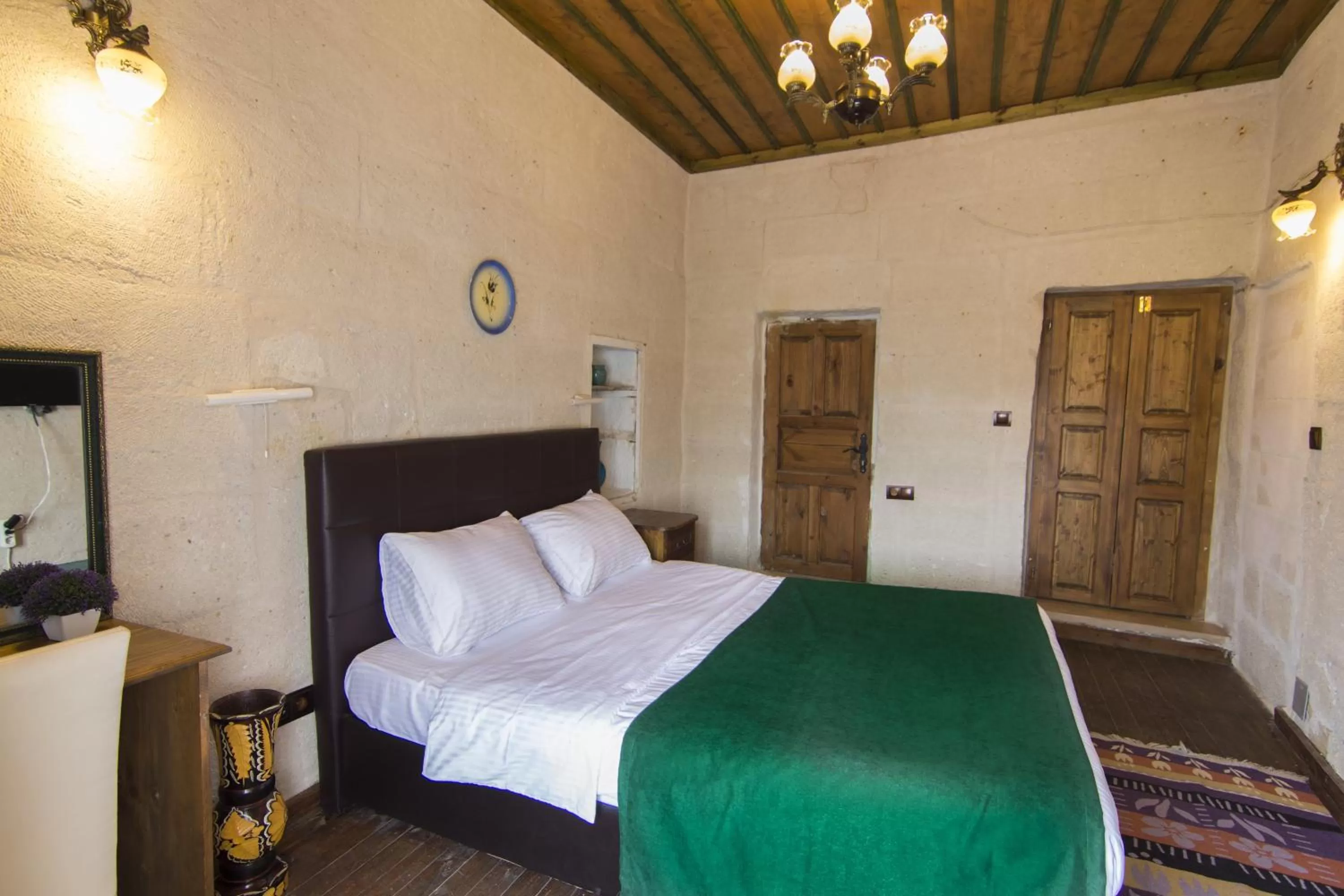 Bed in 7 Oda Kapadokya Cave Hotel