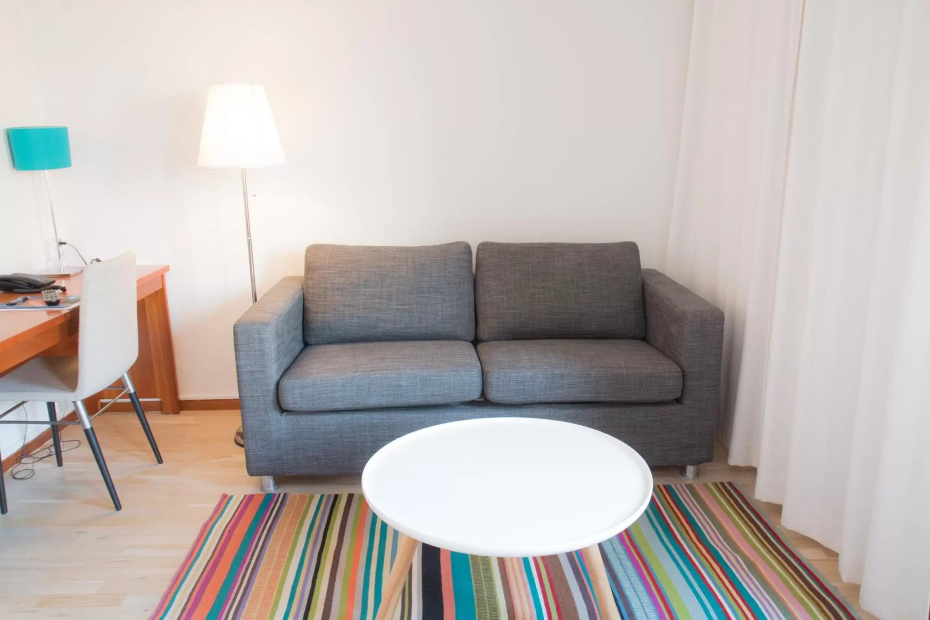 Living room, Seating Area in Hotell Conrad