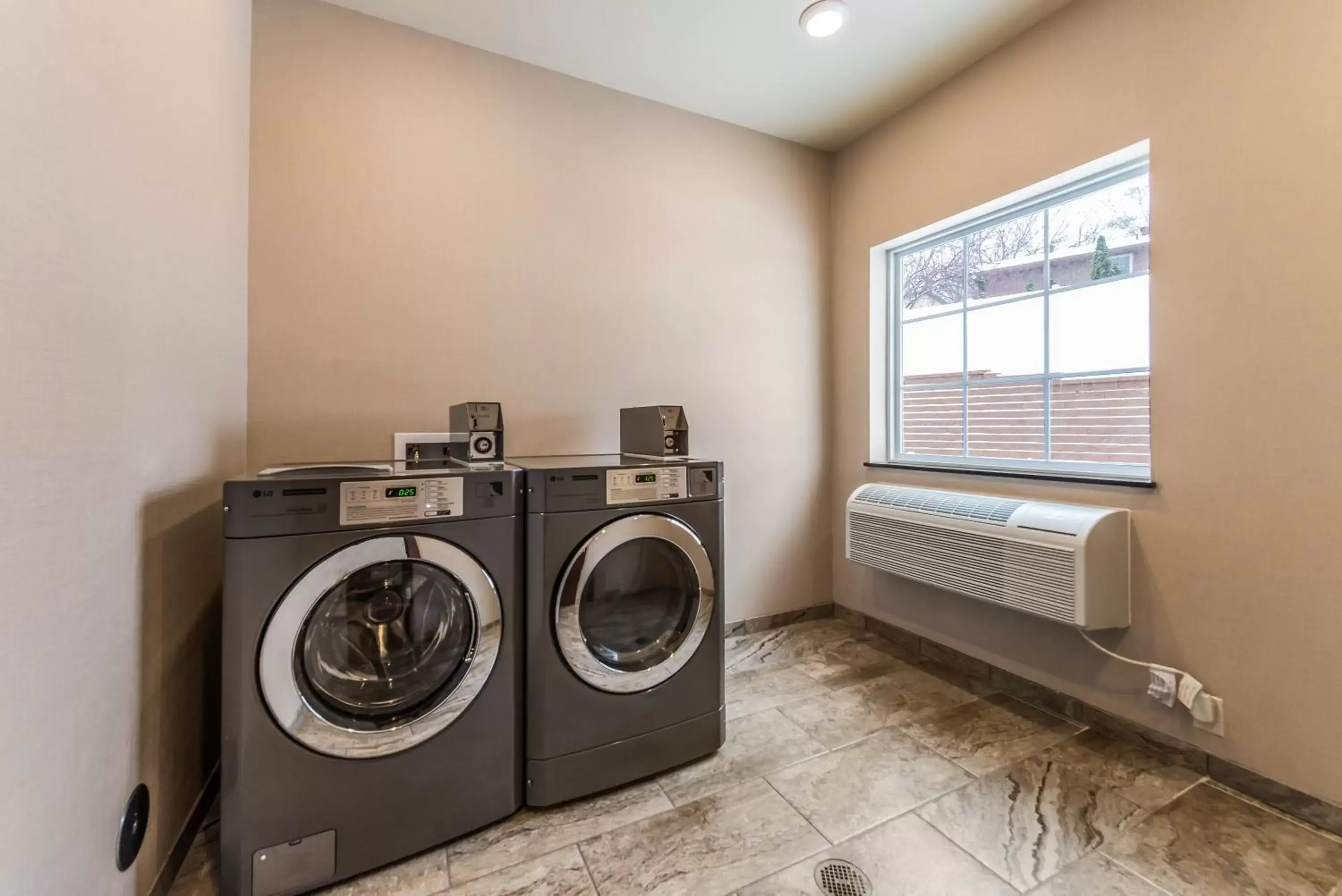 laundry in Cobblestone Hotel & Suites - Hutchinson