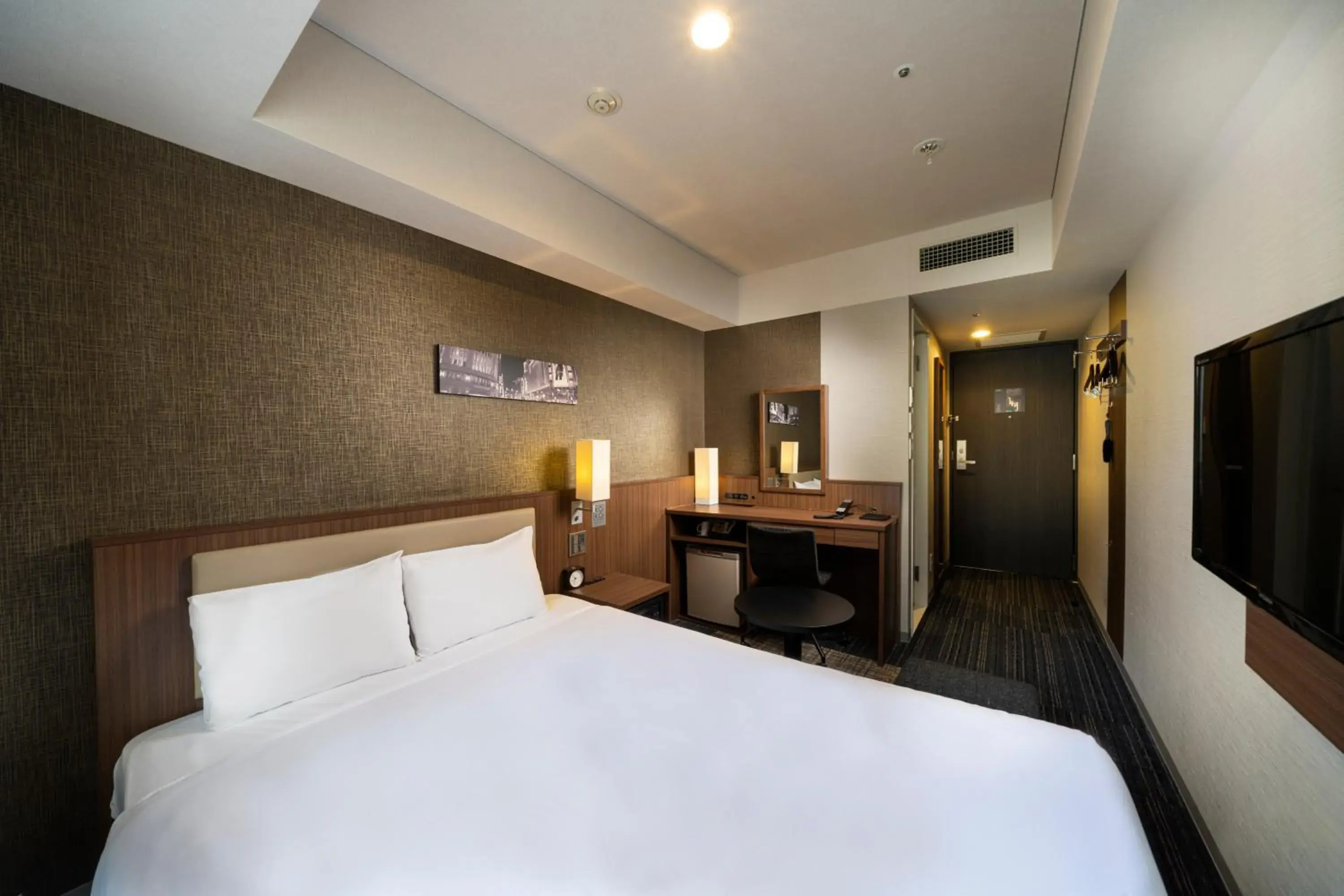 Photo of the whole room, Bed in KOKO HOTEL Ginza-1chome