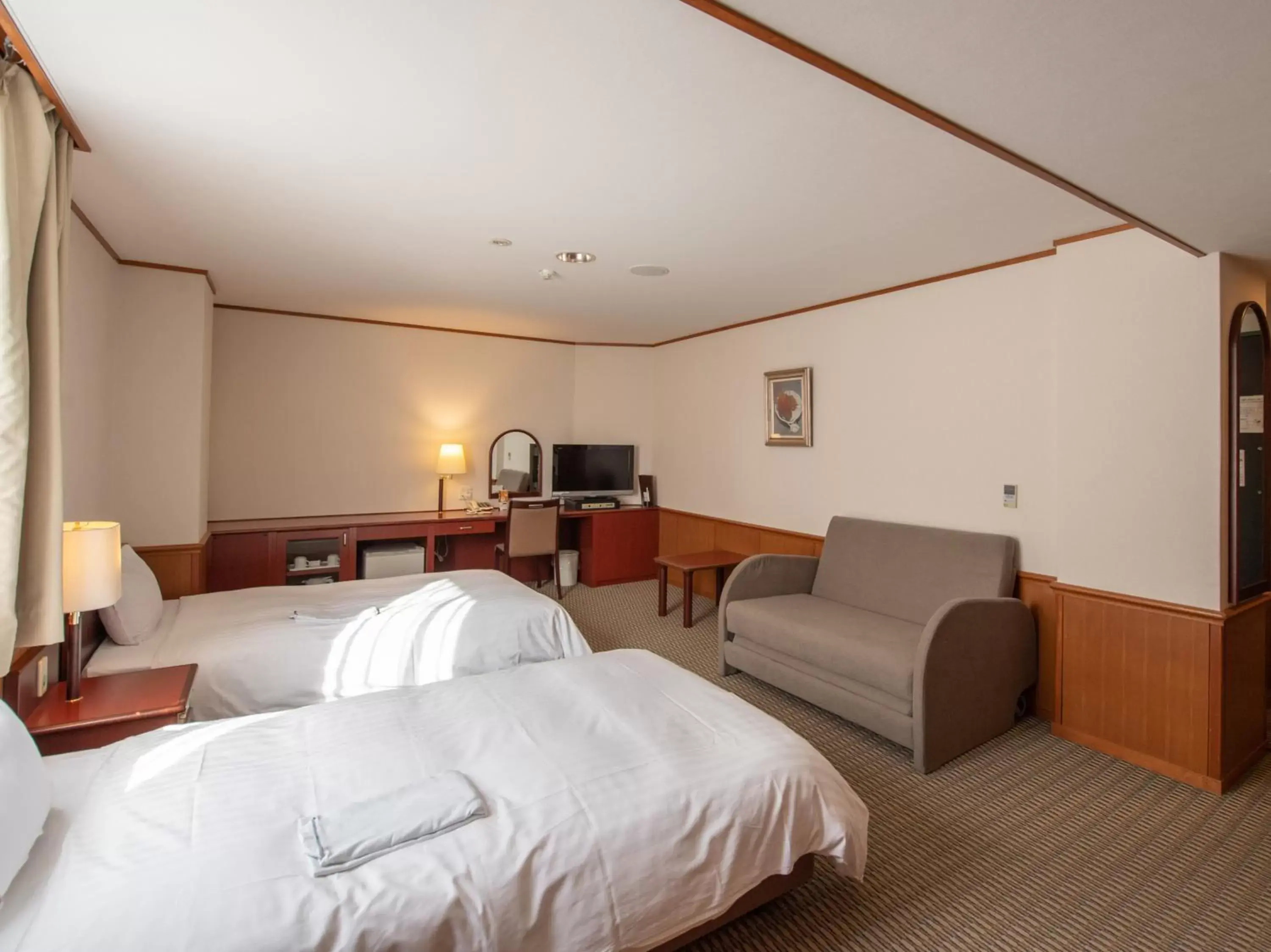 Bed in Hotel Iidaya