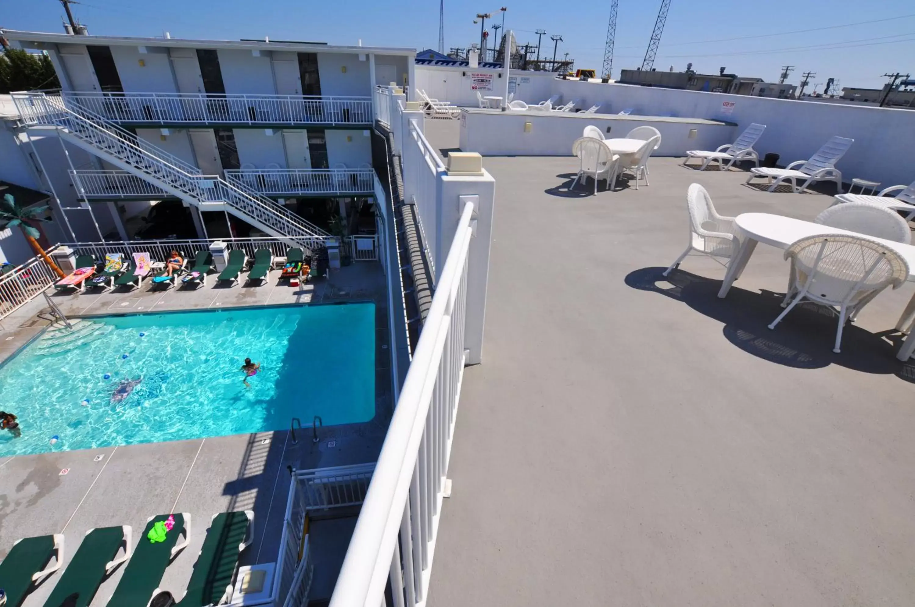 Patio, Pool View in Riviera Resort & Suites