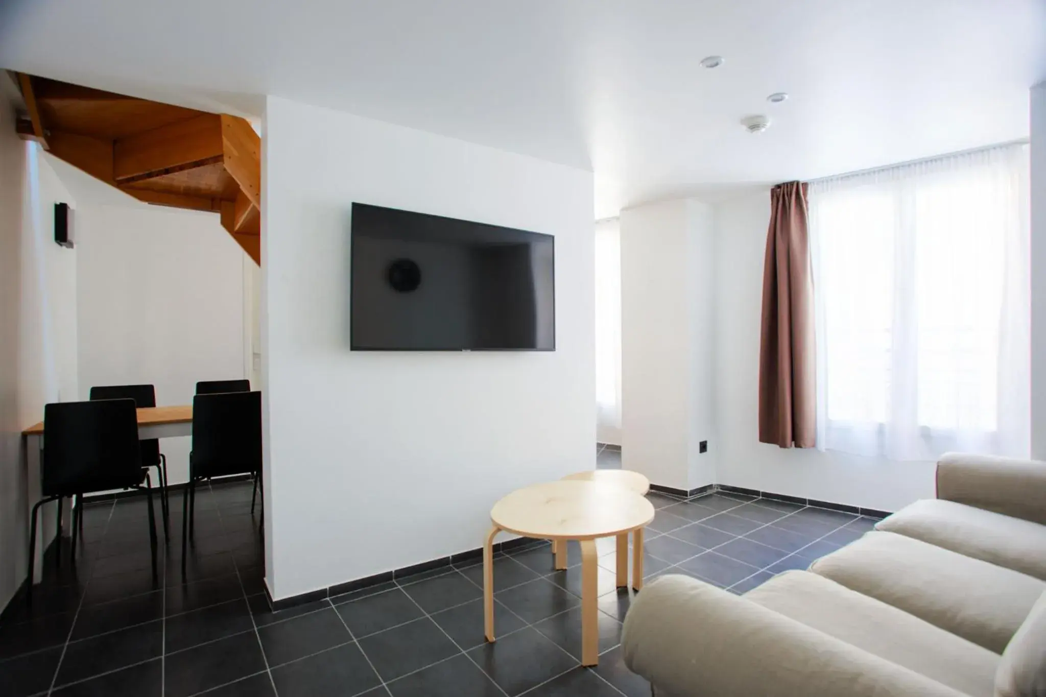 Seating area, TV/Entertainment Center in Hôtel Monsigny