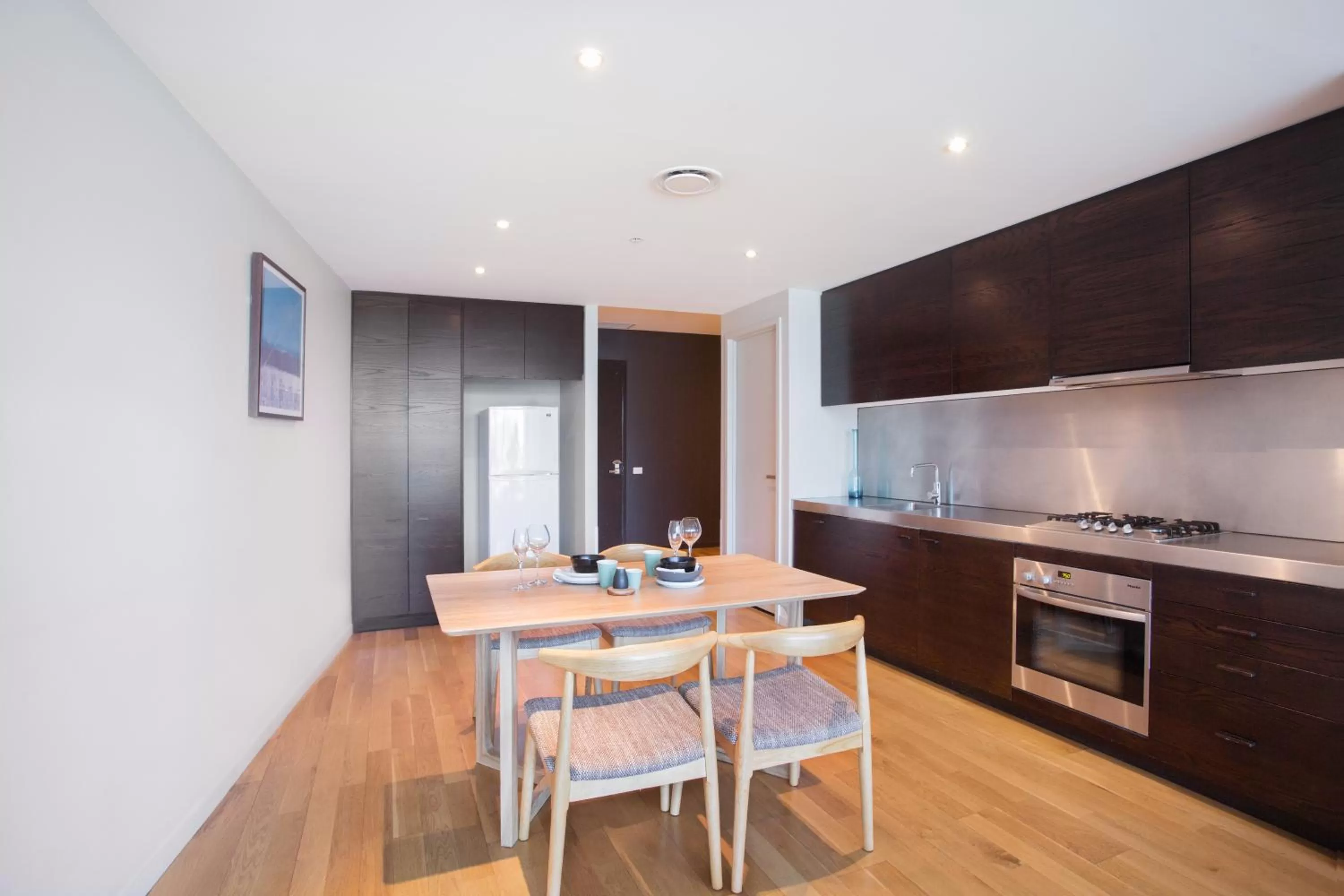 Dining area in The Sebel Residences Melbourne Docklands Serviced Apartments