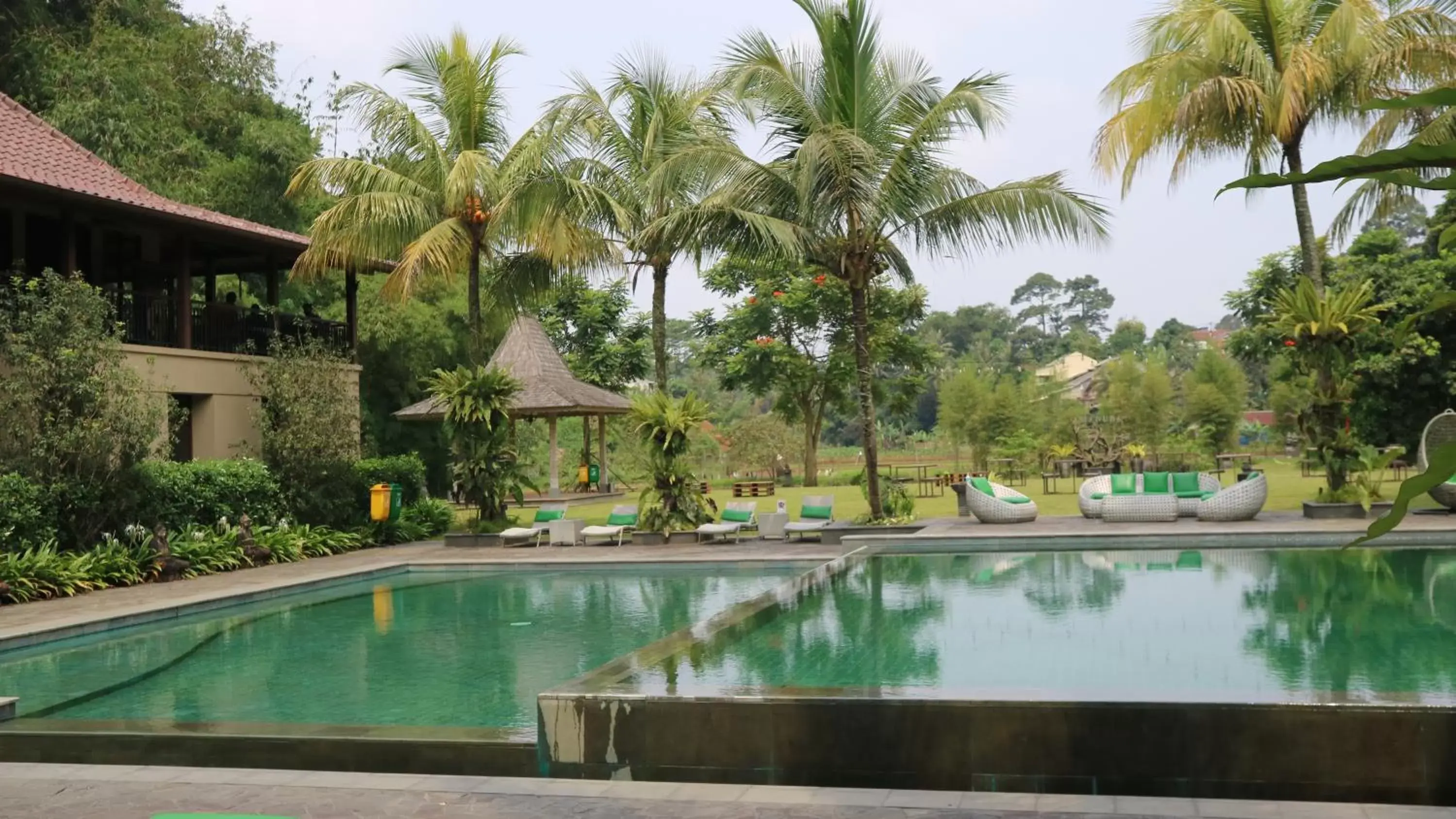 Seating area, Swimming Pool in Amanuba Hotel & Resort Rancamaya