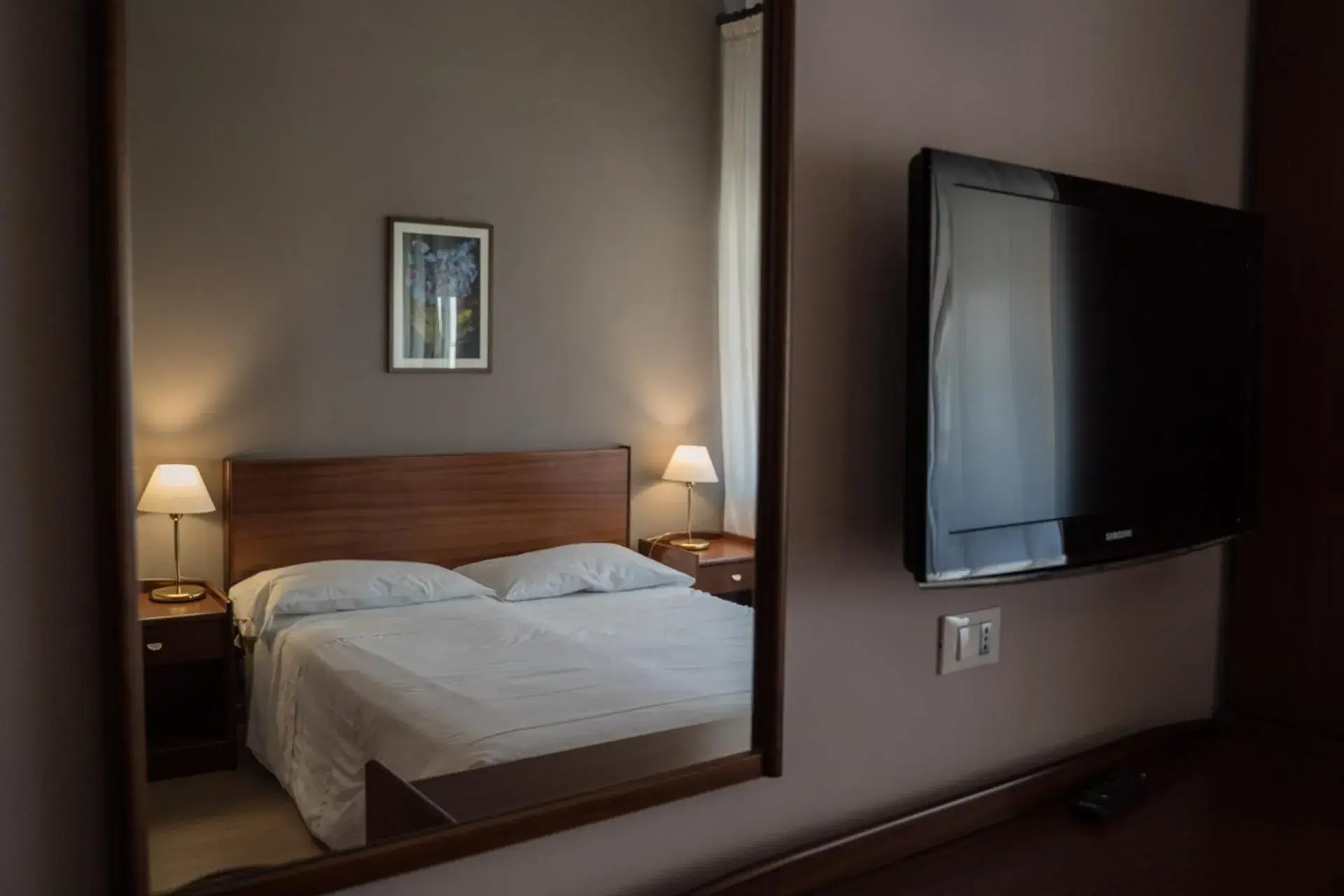 Bed in Hotel Mediterraneo