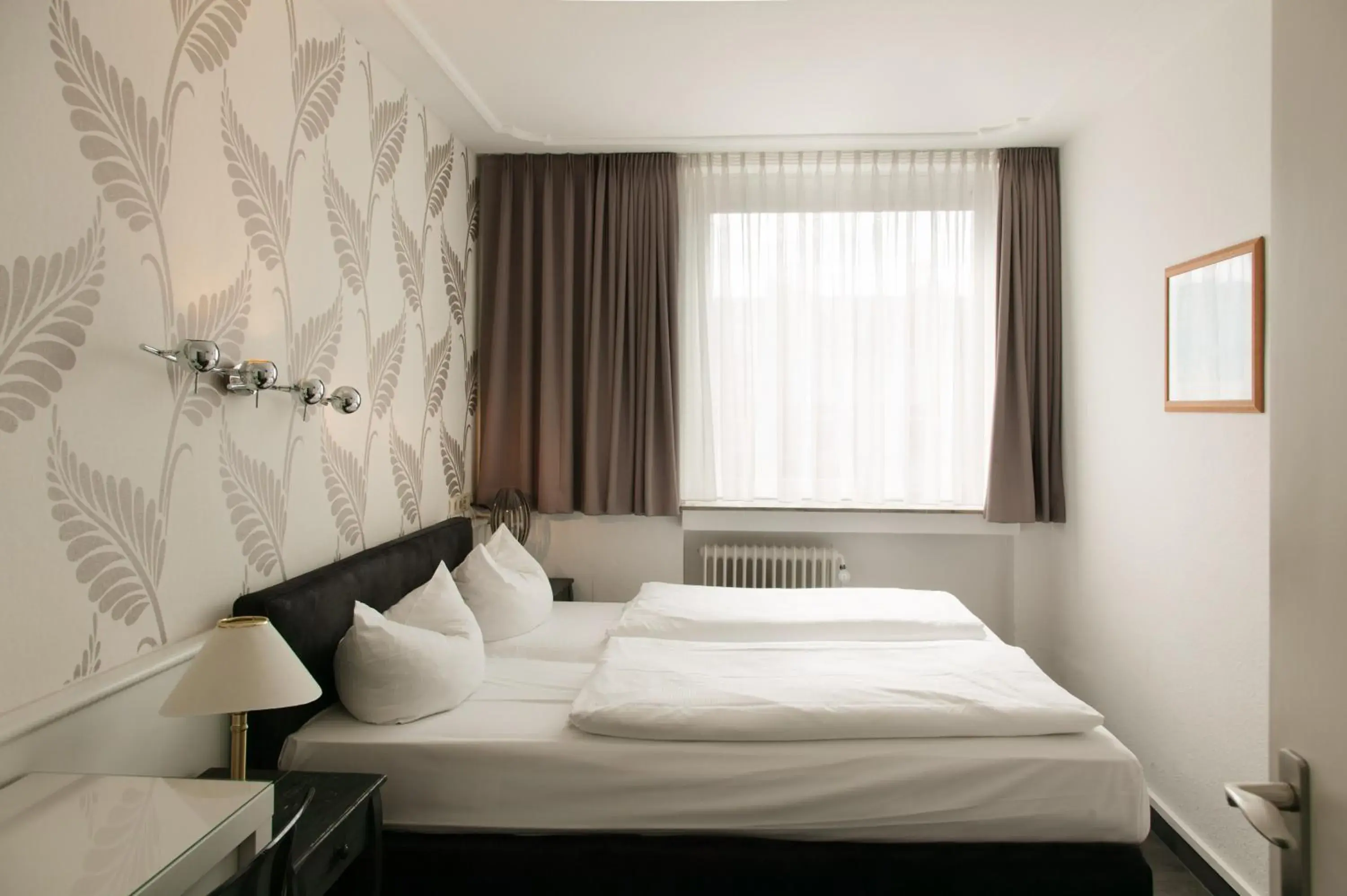 Photo of the whole room, Bed in Hotel Krone Aachen | City-Eurogress
