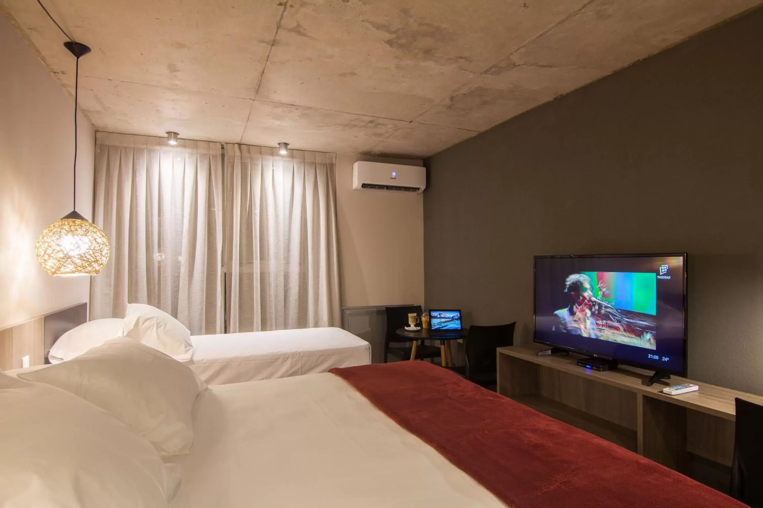 Bed in Hotel Ciudadano Suites