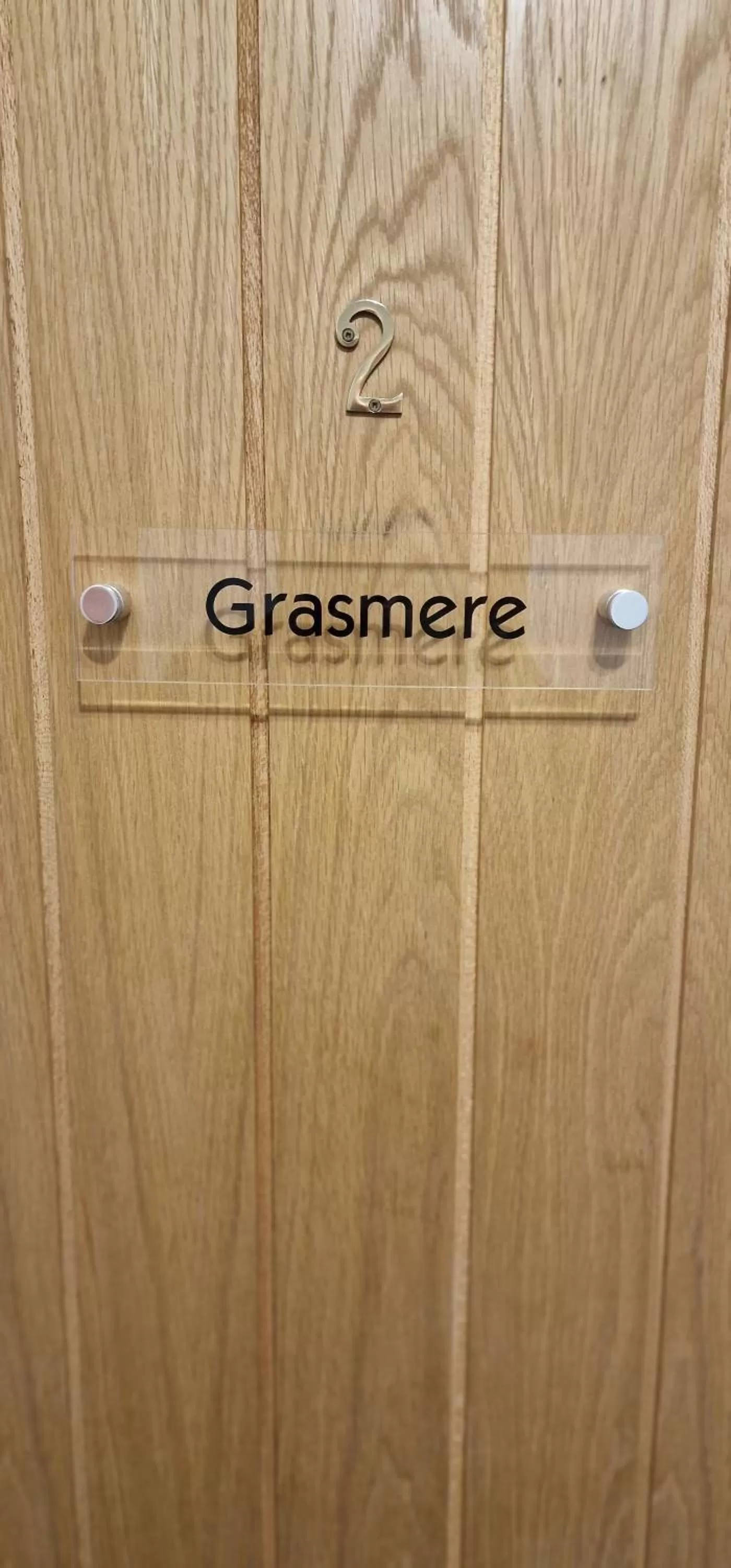 Property logo or sign in Bonny Brae House by Woodland Park