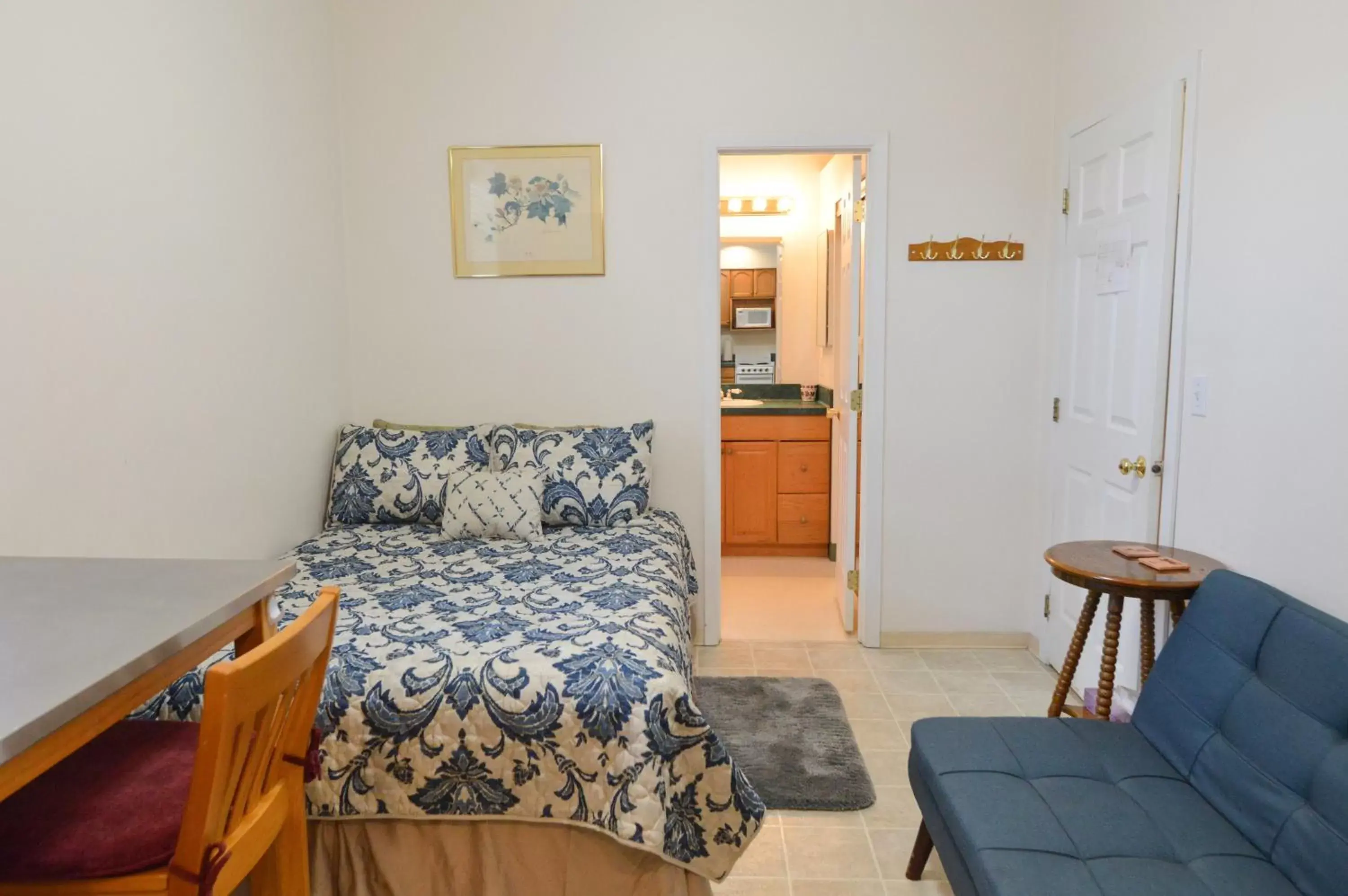 Bed in Brown & Hawkins Historical Apartments