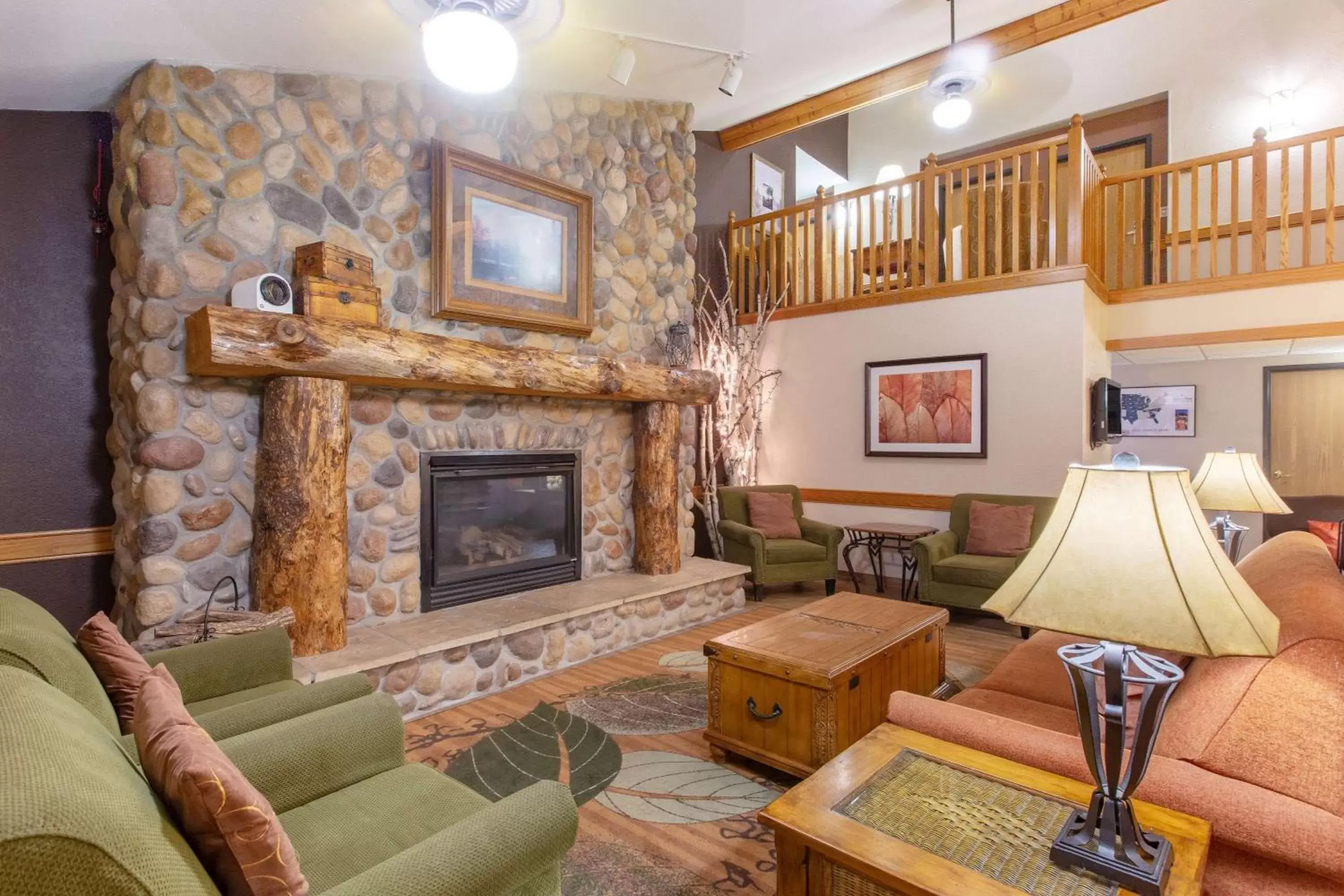 Lobby or reception, Seating Area in AmericInn by Wyndham Cedar Falls