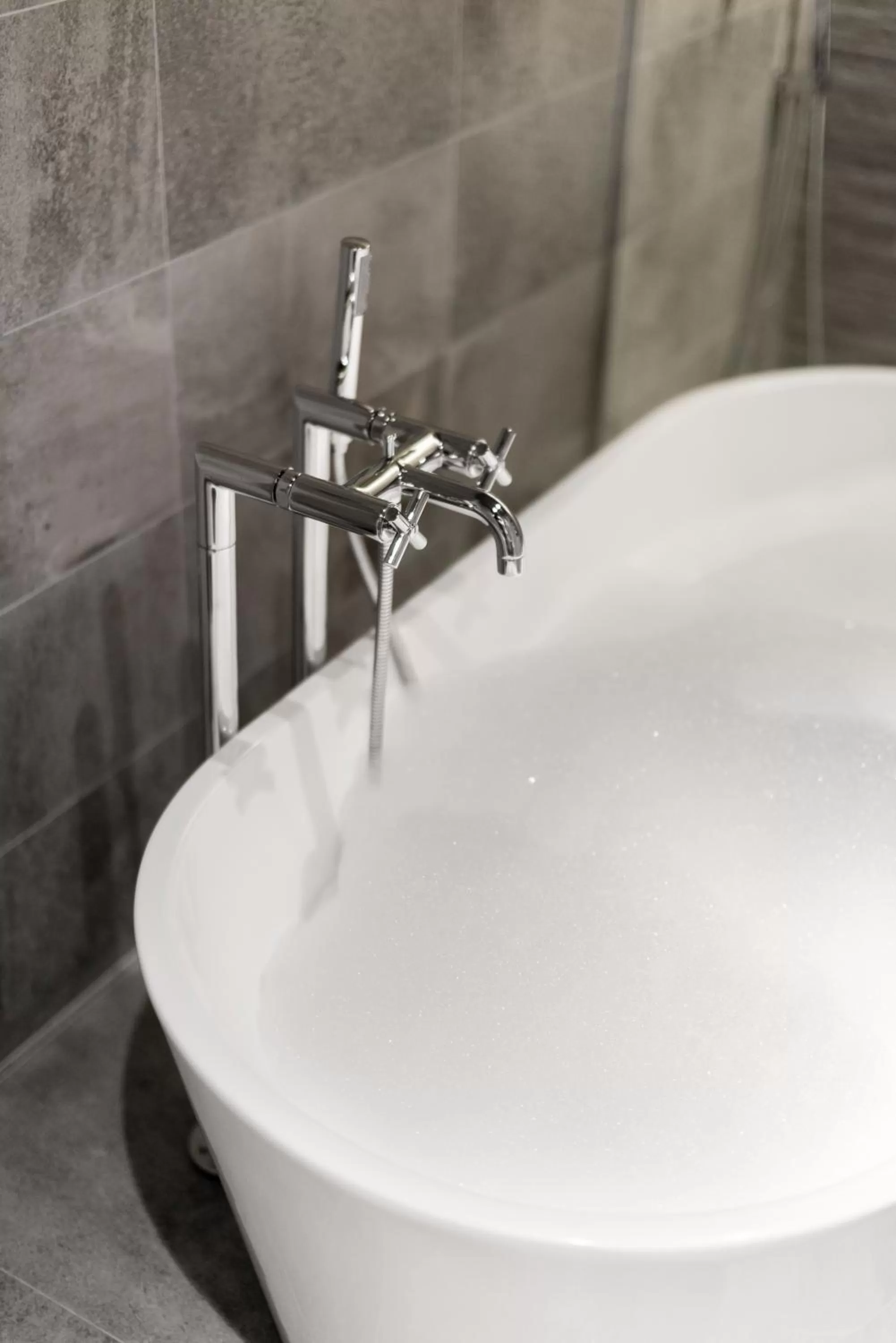 Bathroom in Jolly Alon Hotel & Business Center