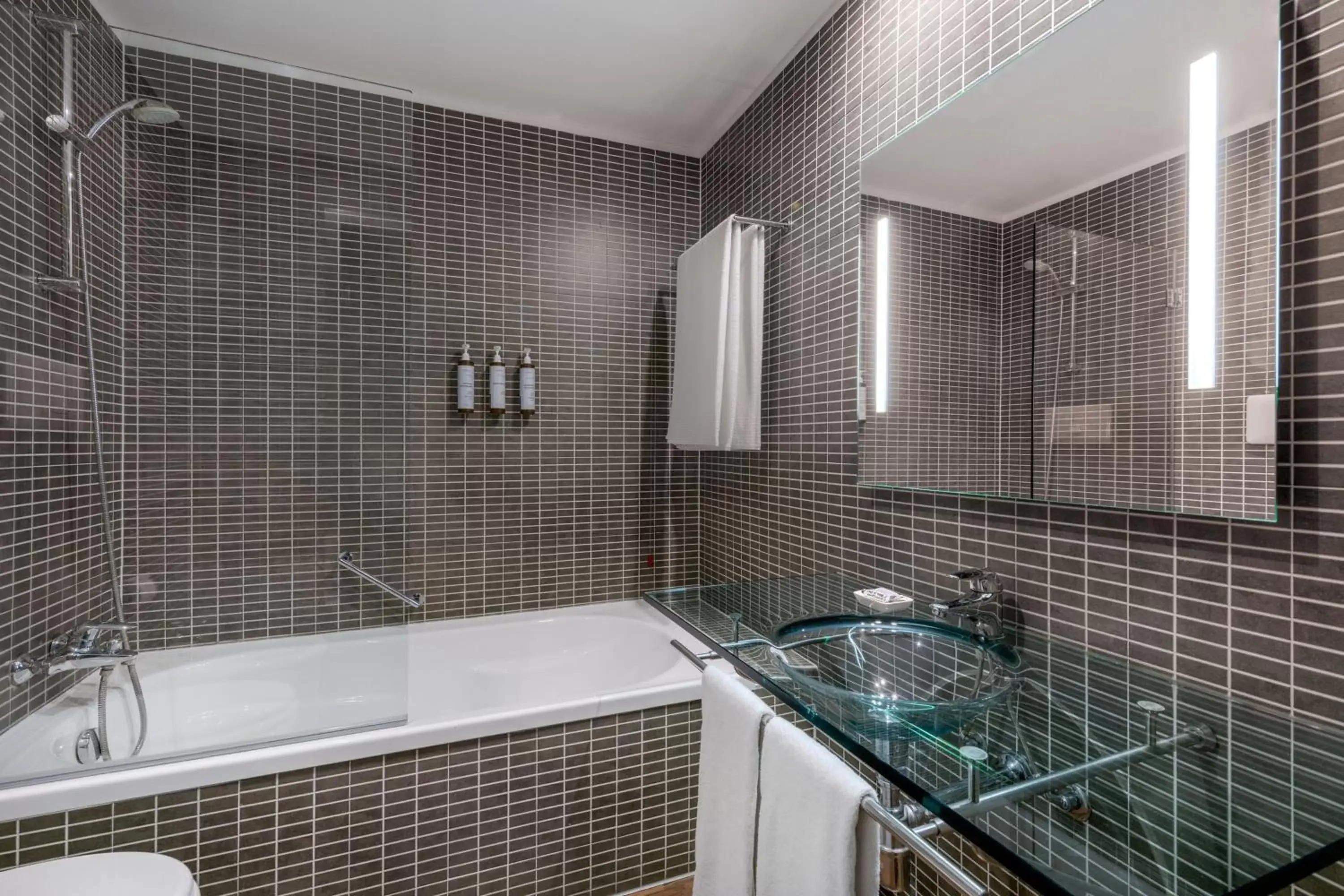 Bathroom in AC Hotel Brescia by Marriott
