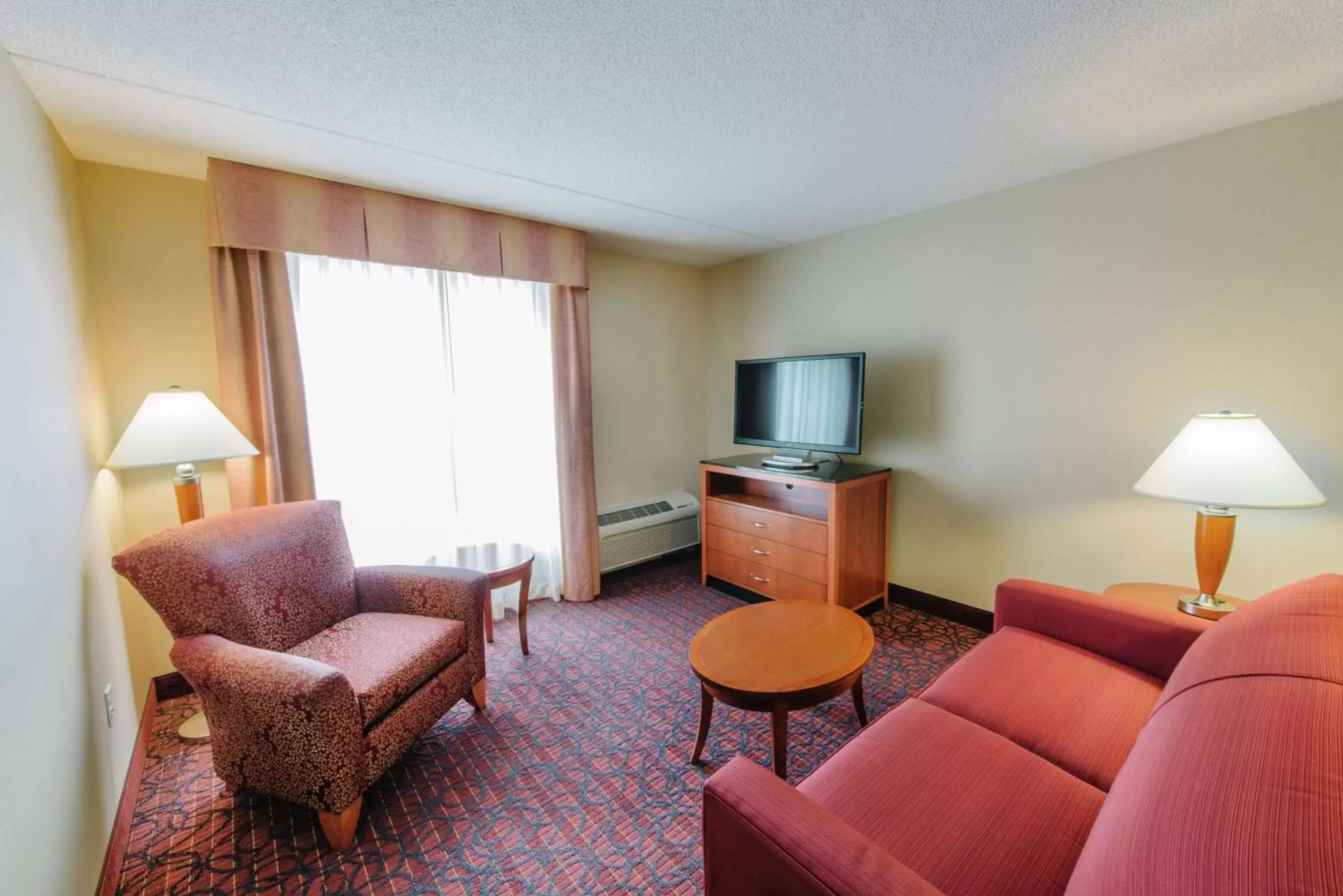 Living room, Seating Area in Hilton Garden Inn Manchester Downtown