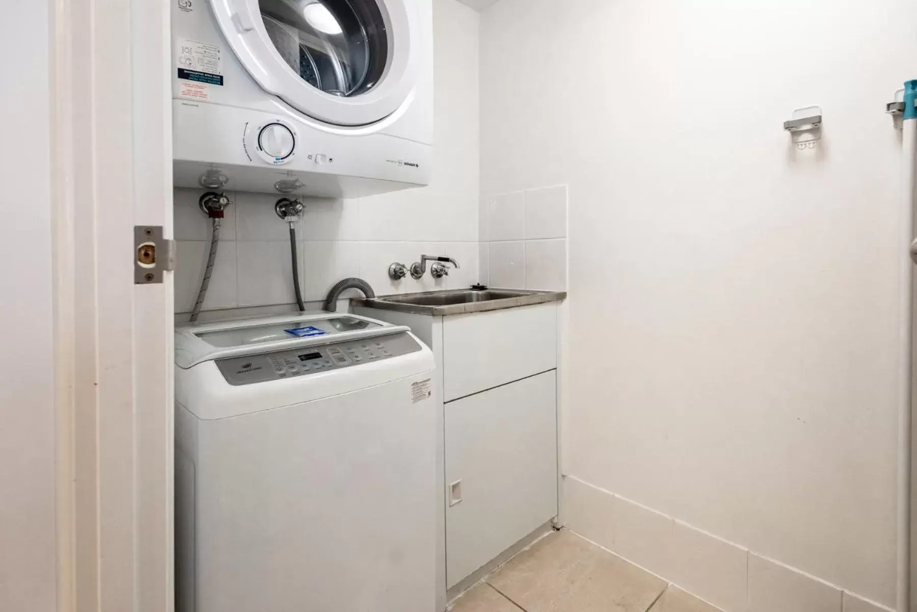 laundry, Kitchen/Kitchenette in Bargara Blue Resort