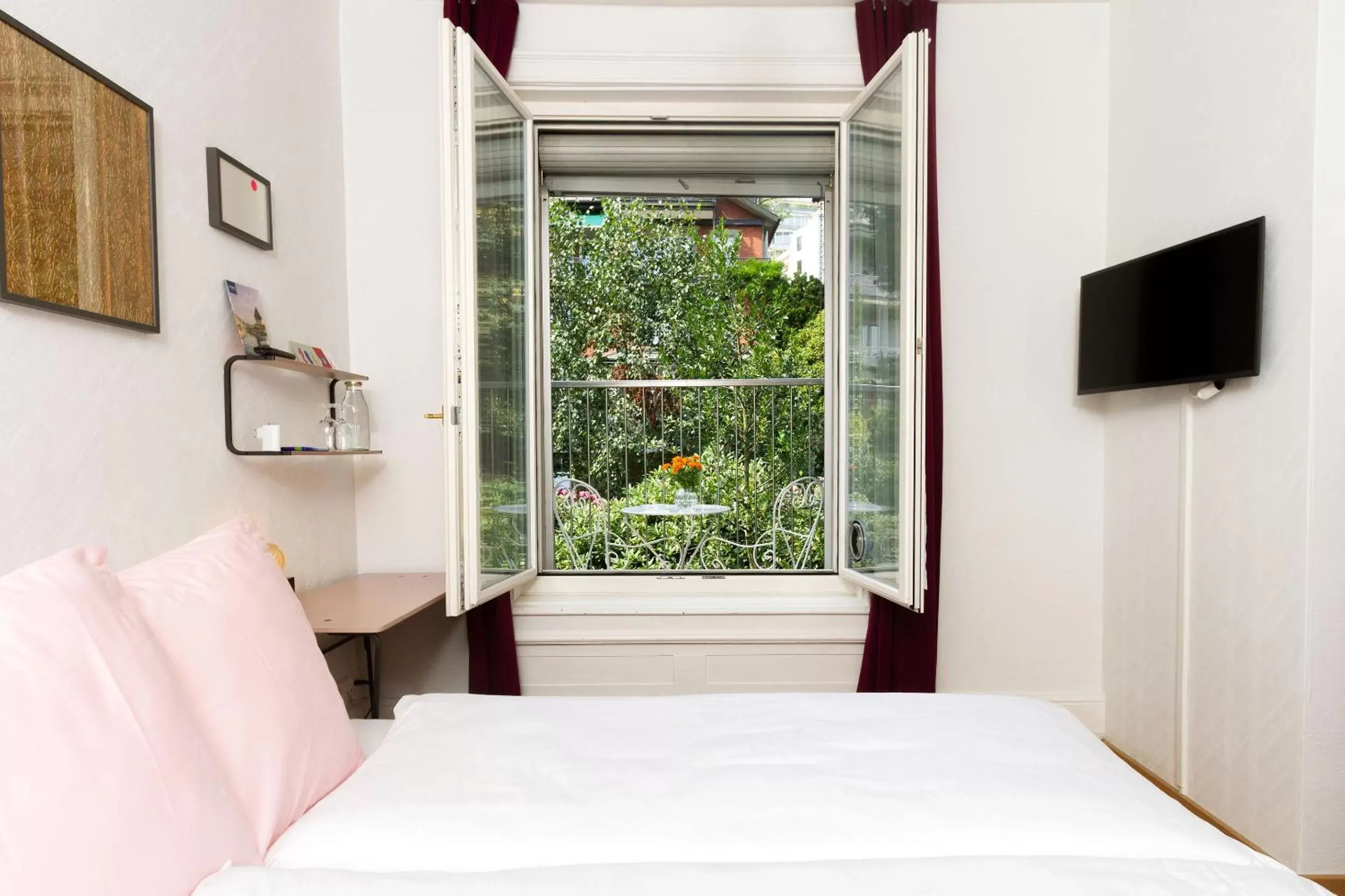 Photo of the whole room, Bed in Hotel Beau Séjour Lucerne