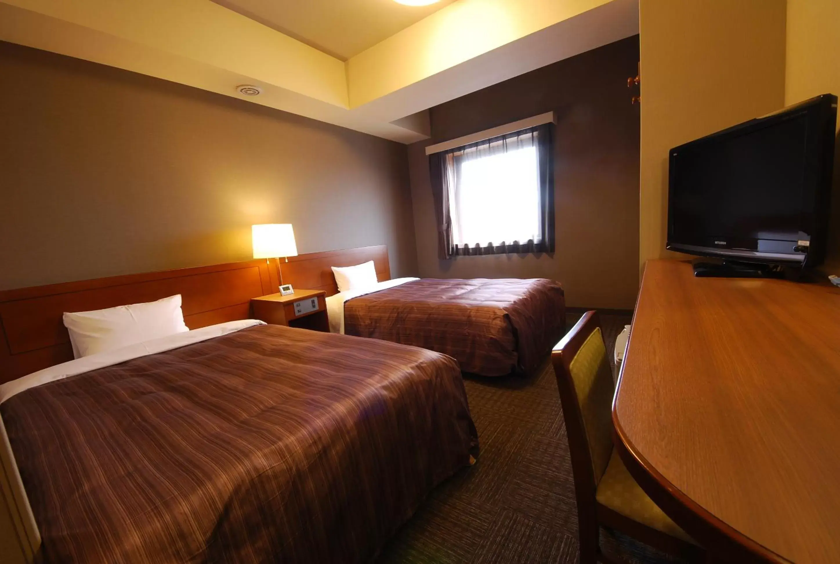 Bed in Hotel Route-Inn Misawa