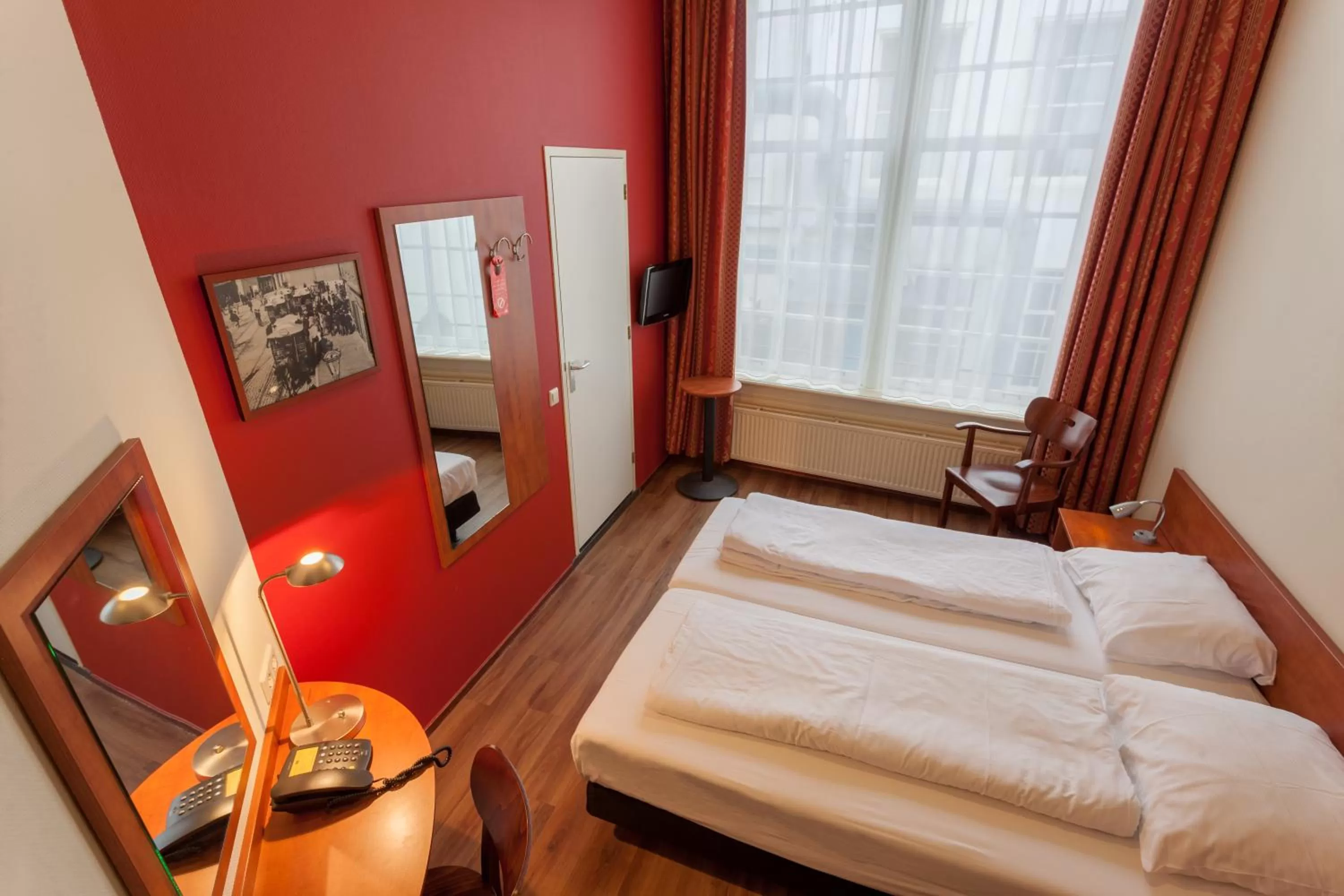 Bed in A-Train Hotel