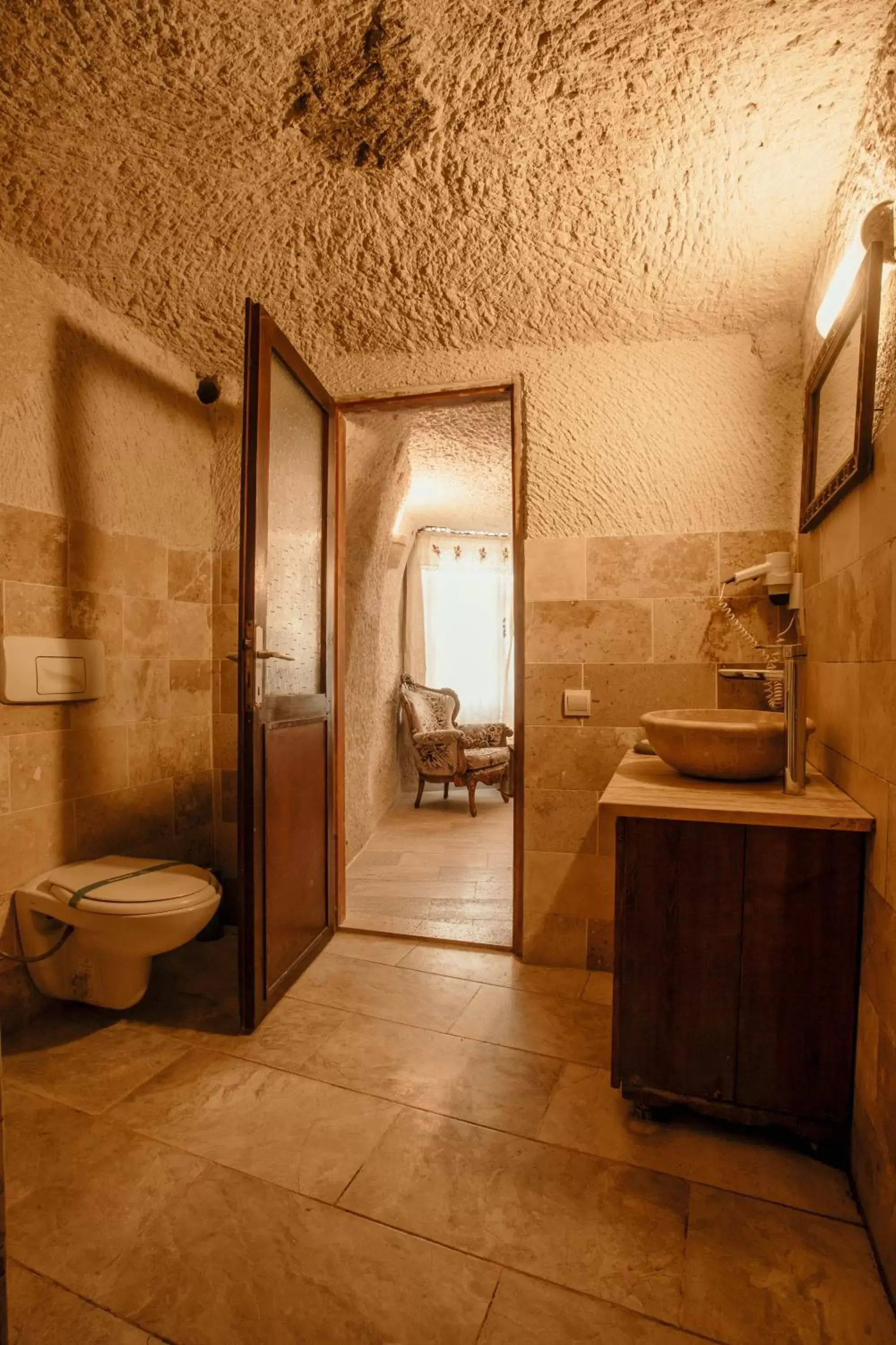 Toilet, Bathroom in Village Cave House Hotel