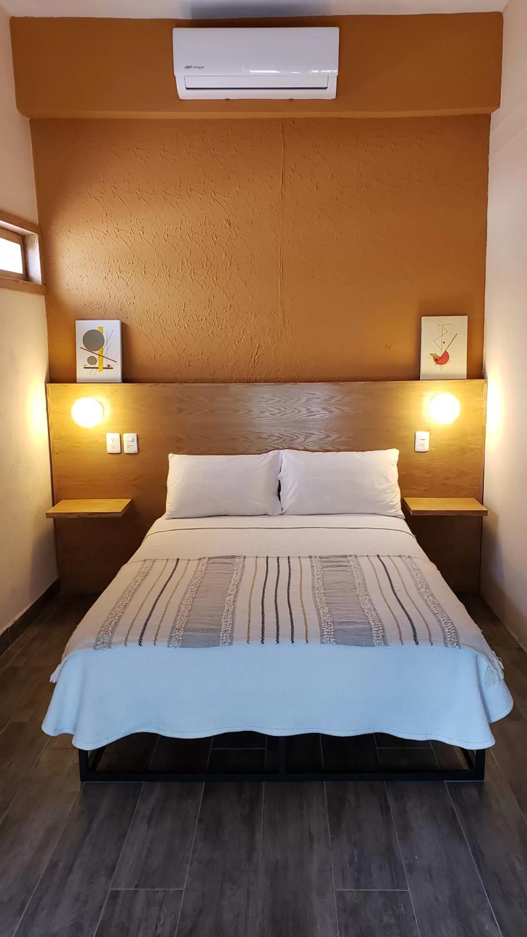 Bed in Hotel Grand Isitia