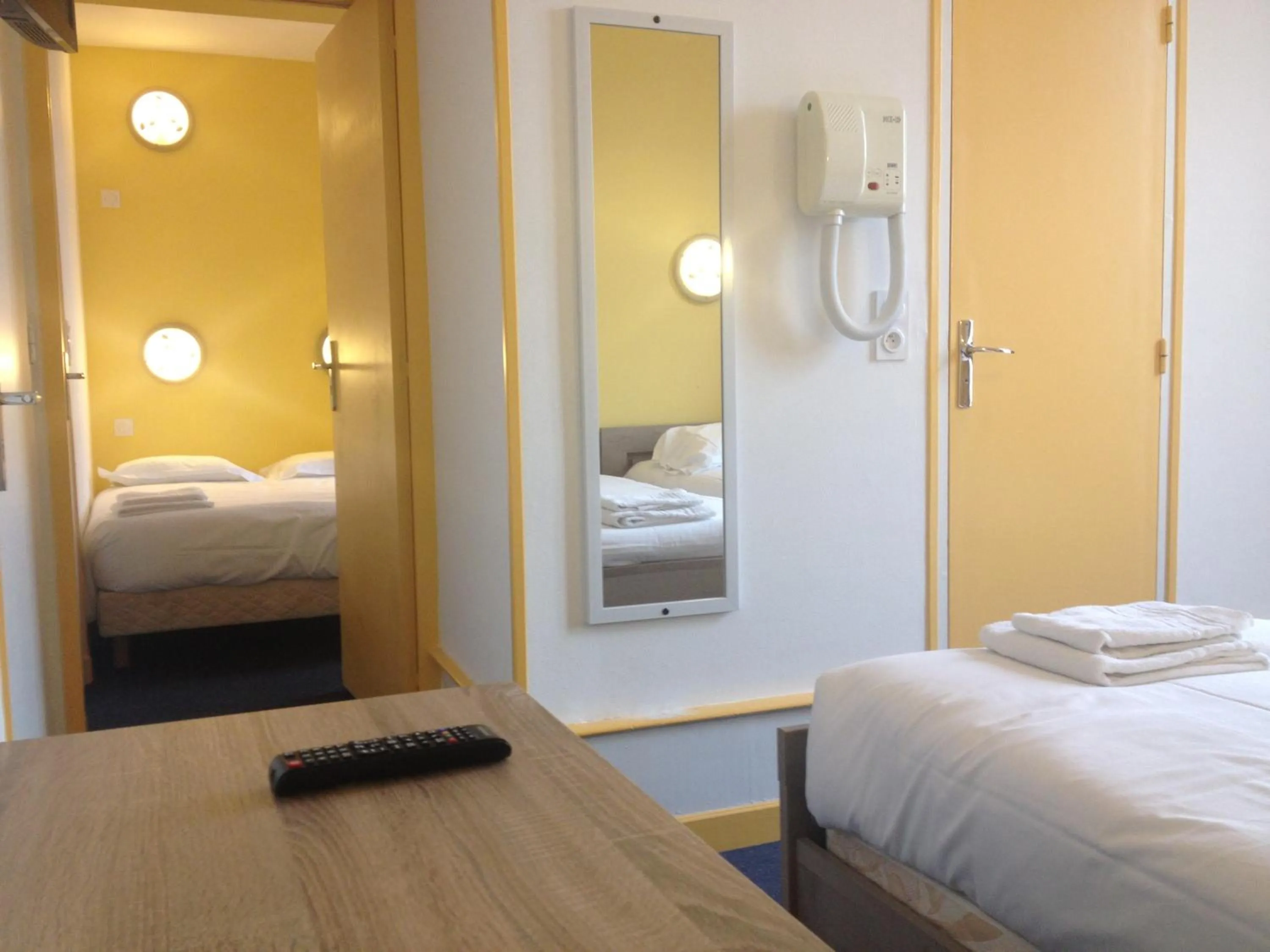 Photo of the whole room, Bed in Hotel Couleurs Sud Centre-ville Gare Charleville-Mézières