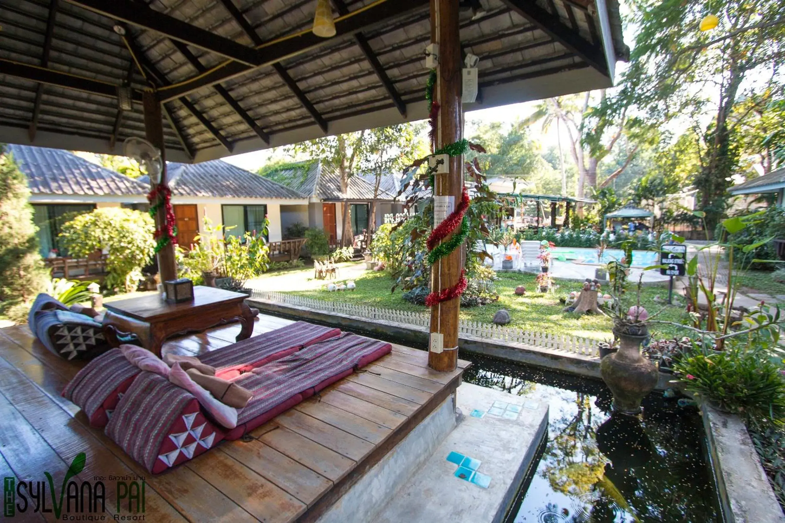 Garden, Swimming Pool in The Sylvana Pai Hotel