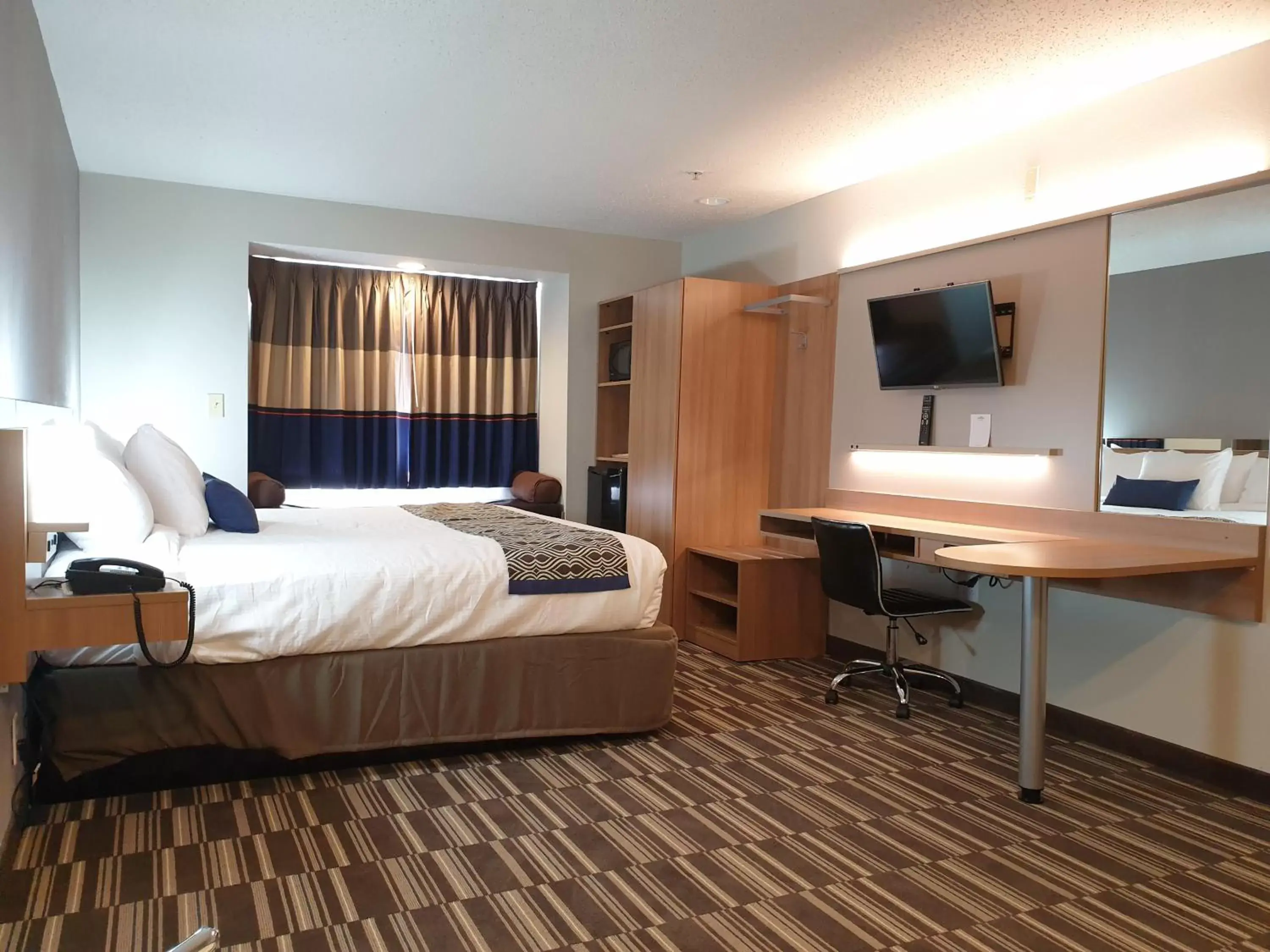 Bed in Microtel Inn & Suites by Wyndham Augusta/Riverwatch