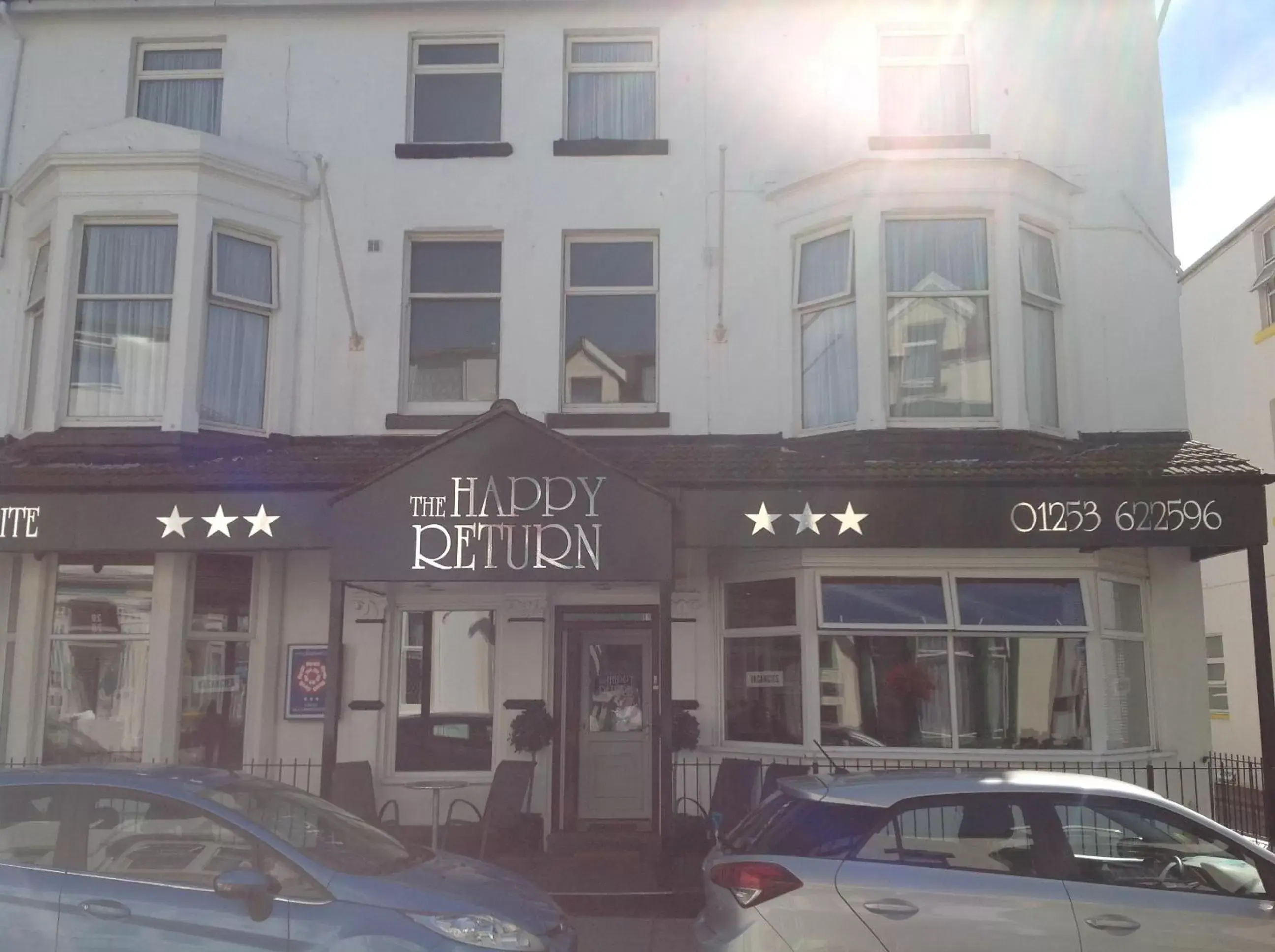 Facade/entrance, Property Building in Happy Return Hotel