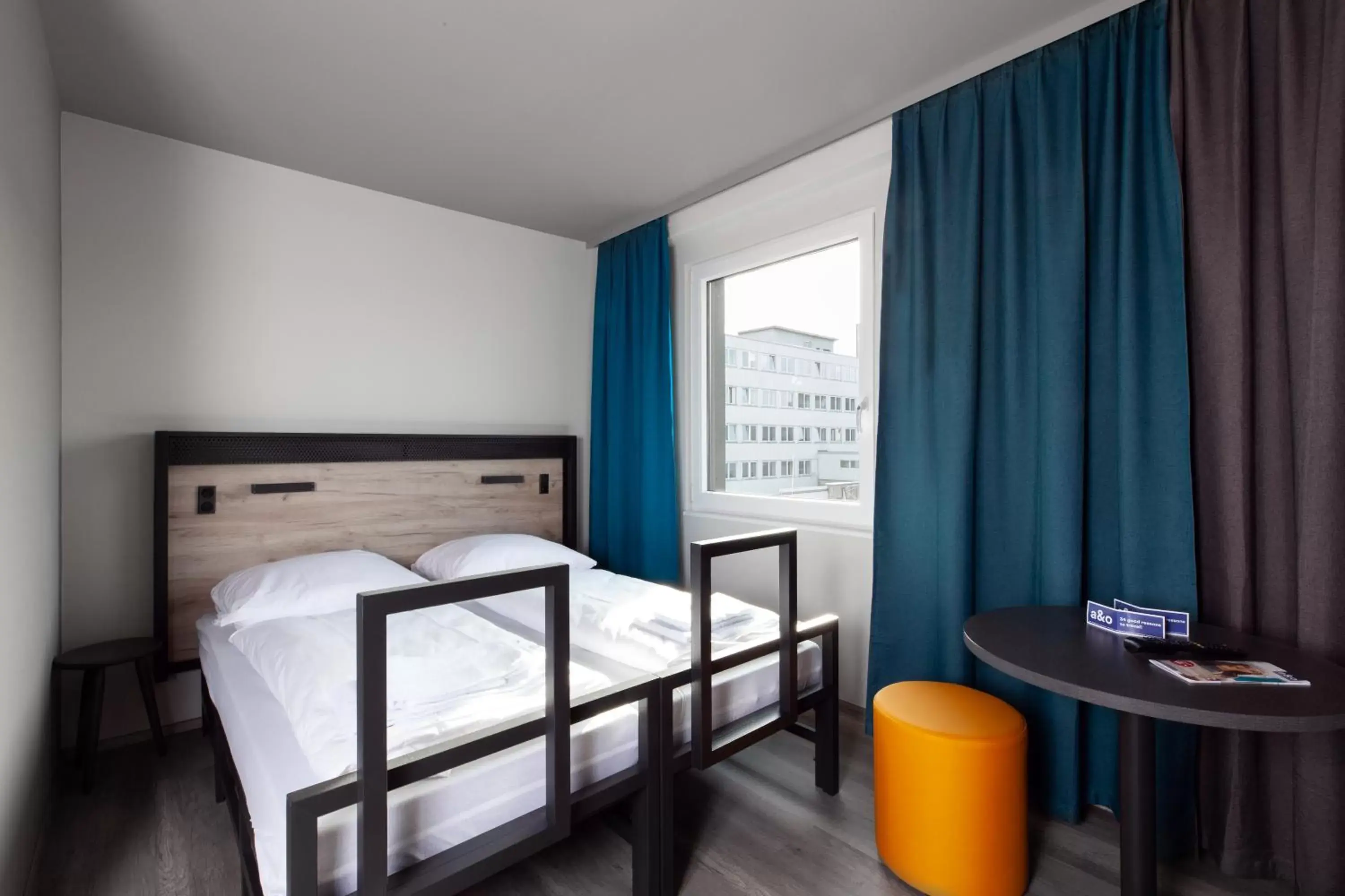 Photo of the whole room, Bed in a&o Frankfurt Ostend