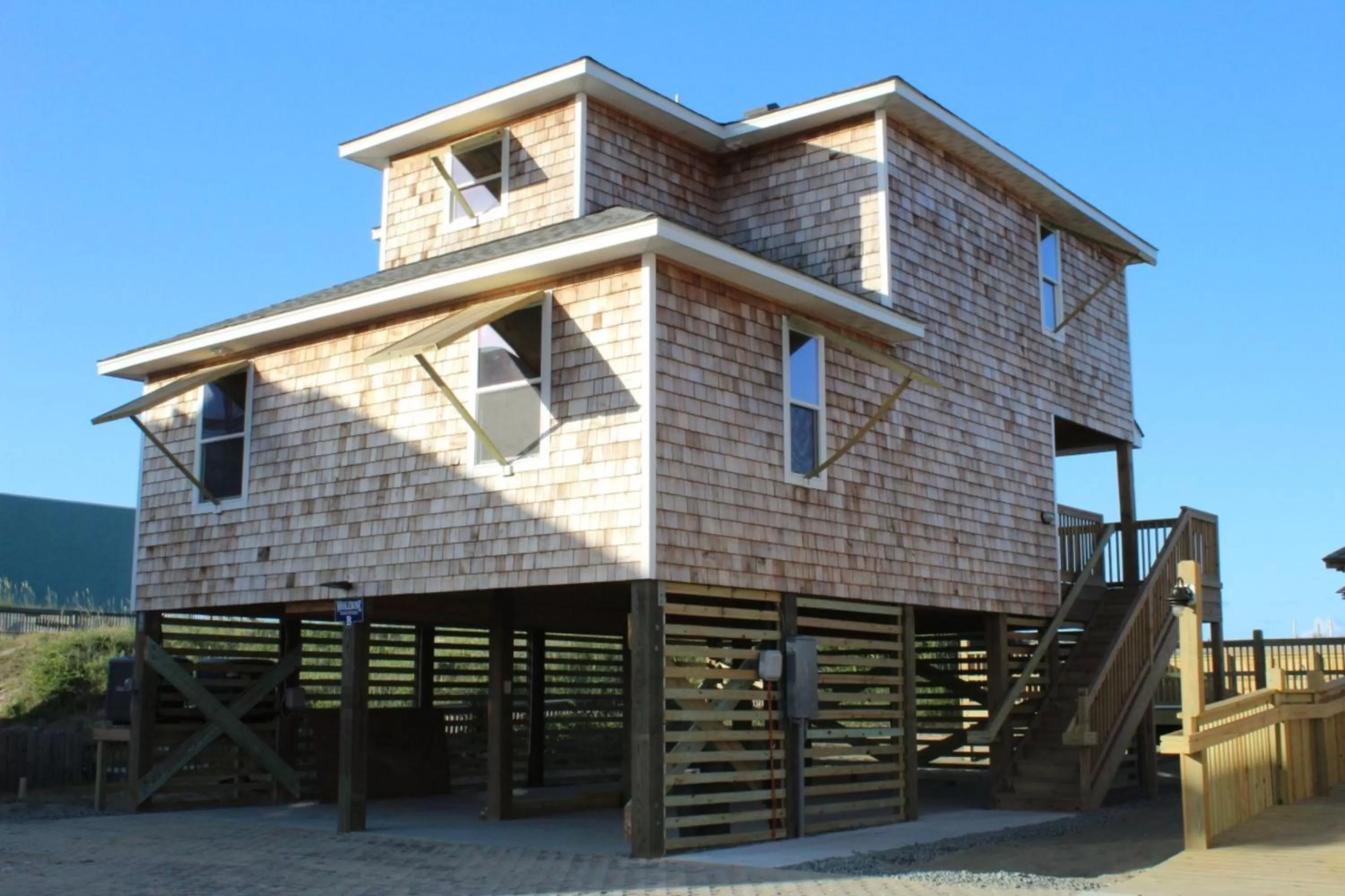 Property building in Whalebone Ocean Cottages by KEES Vacations