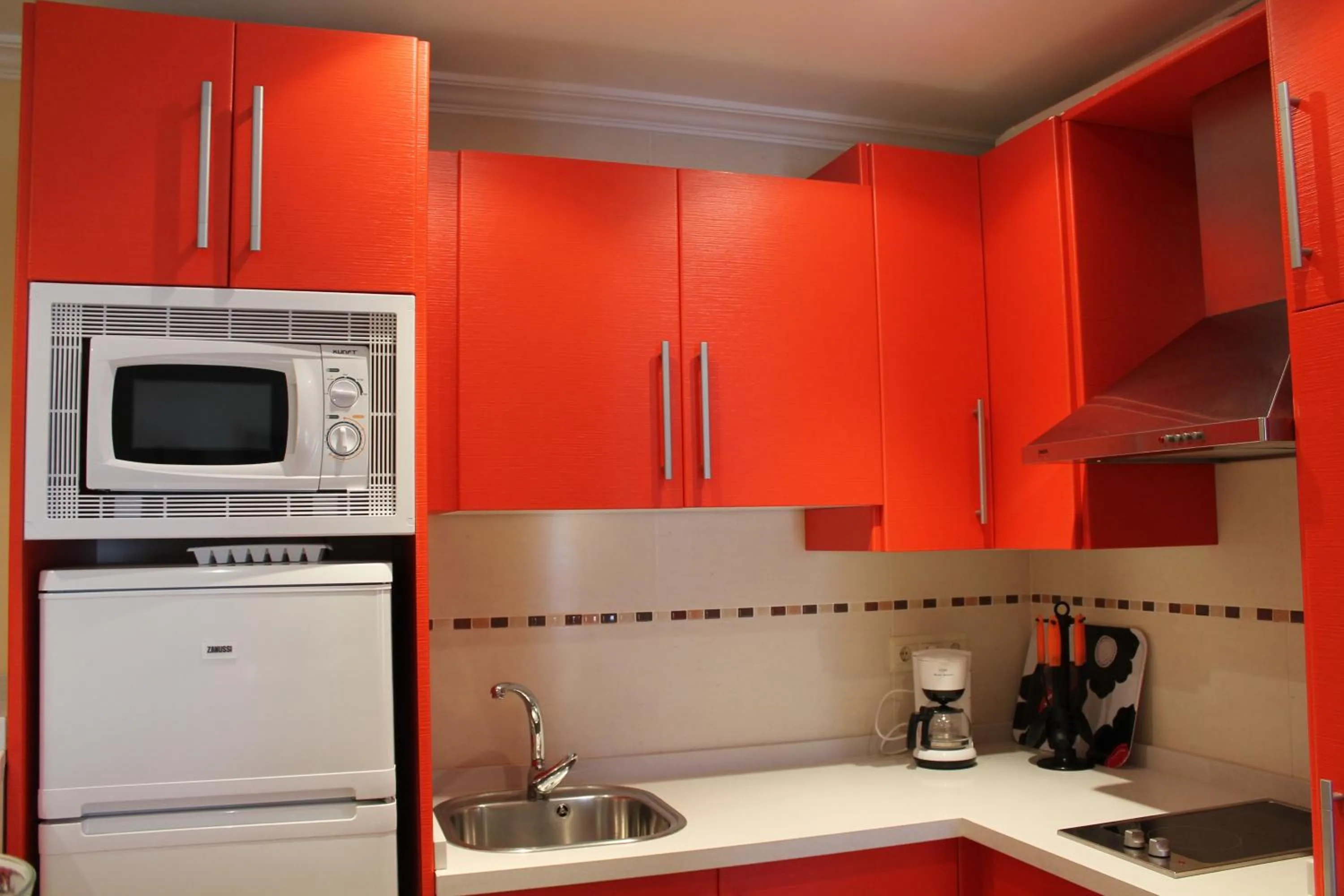 Kitchen or kitchenette in Apartamentos Turísticos Plaza del Olvido