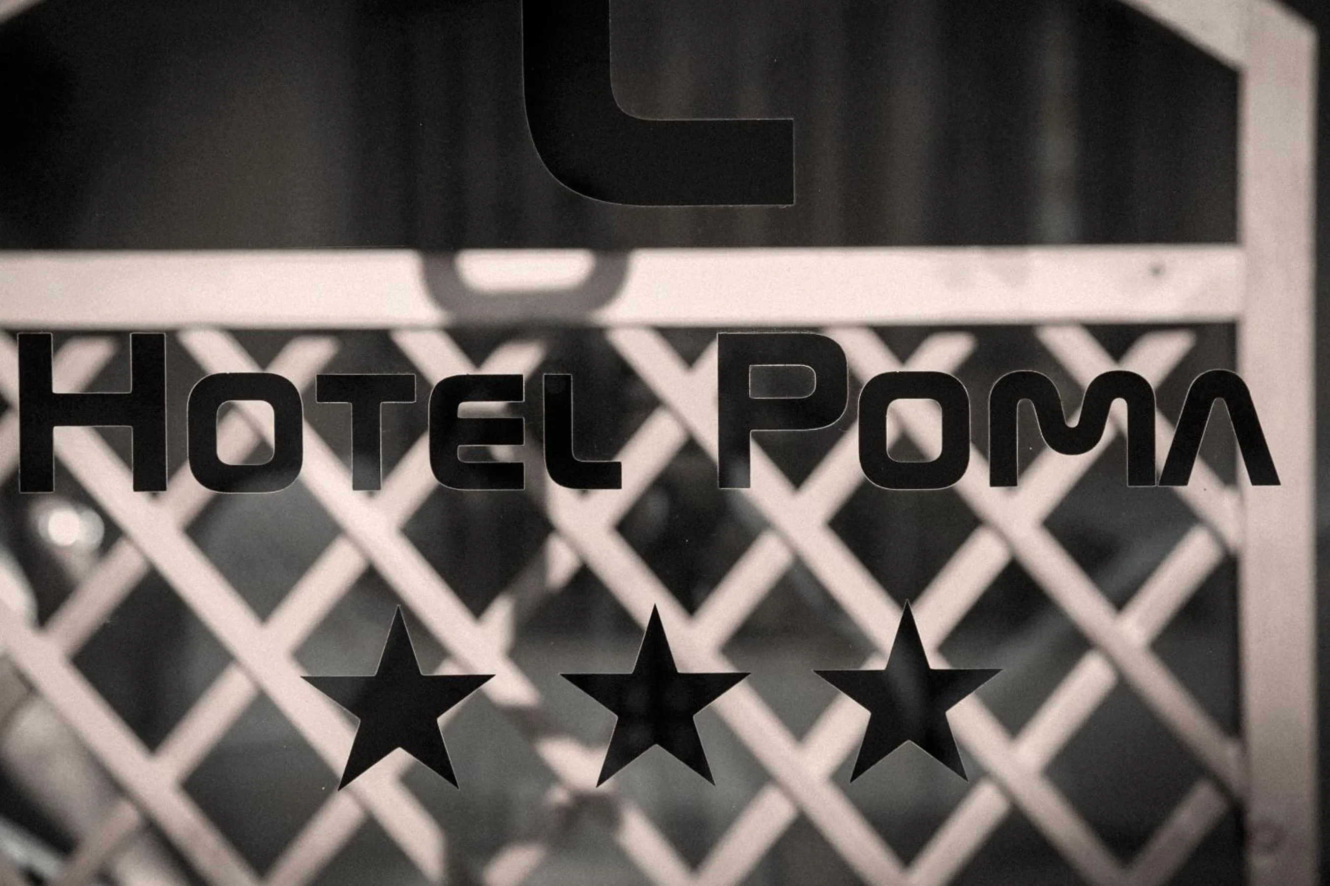 Property logo or sign in HOTEL Poma