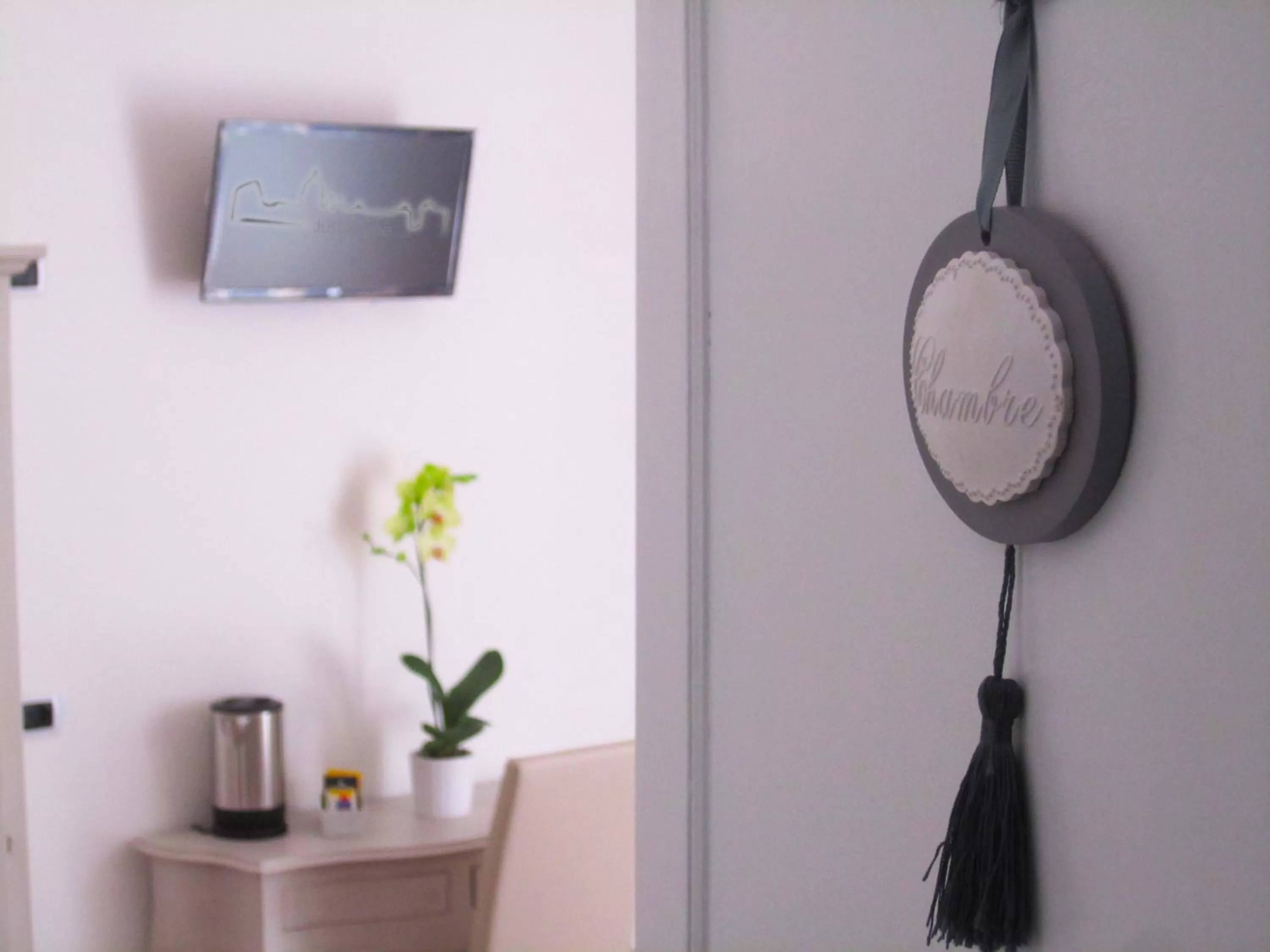 Decorative detail, TV/Entertainment Center in B&B Exa Rooms - Just Rome