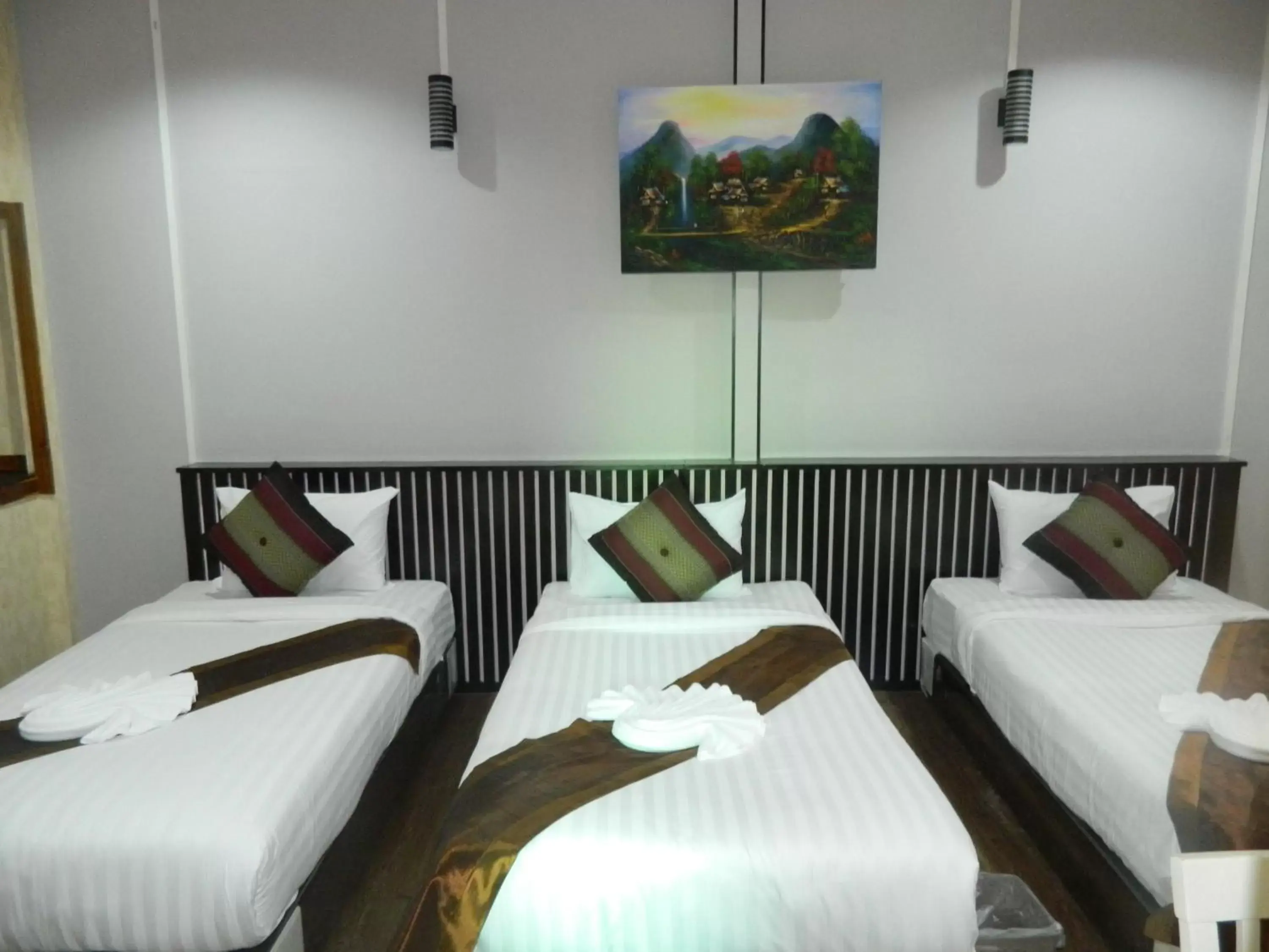 Bed in Pai Iyara Resort