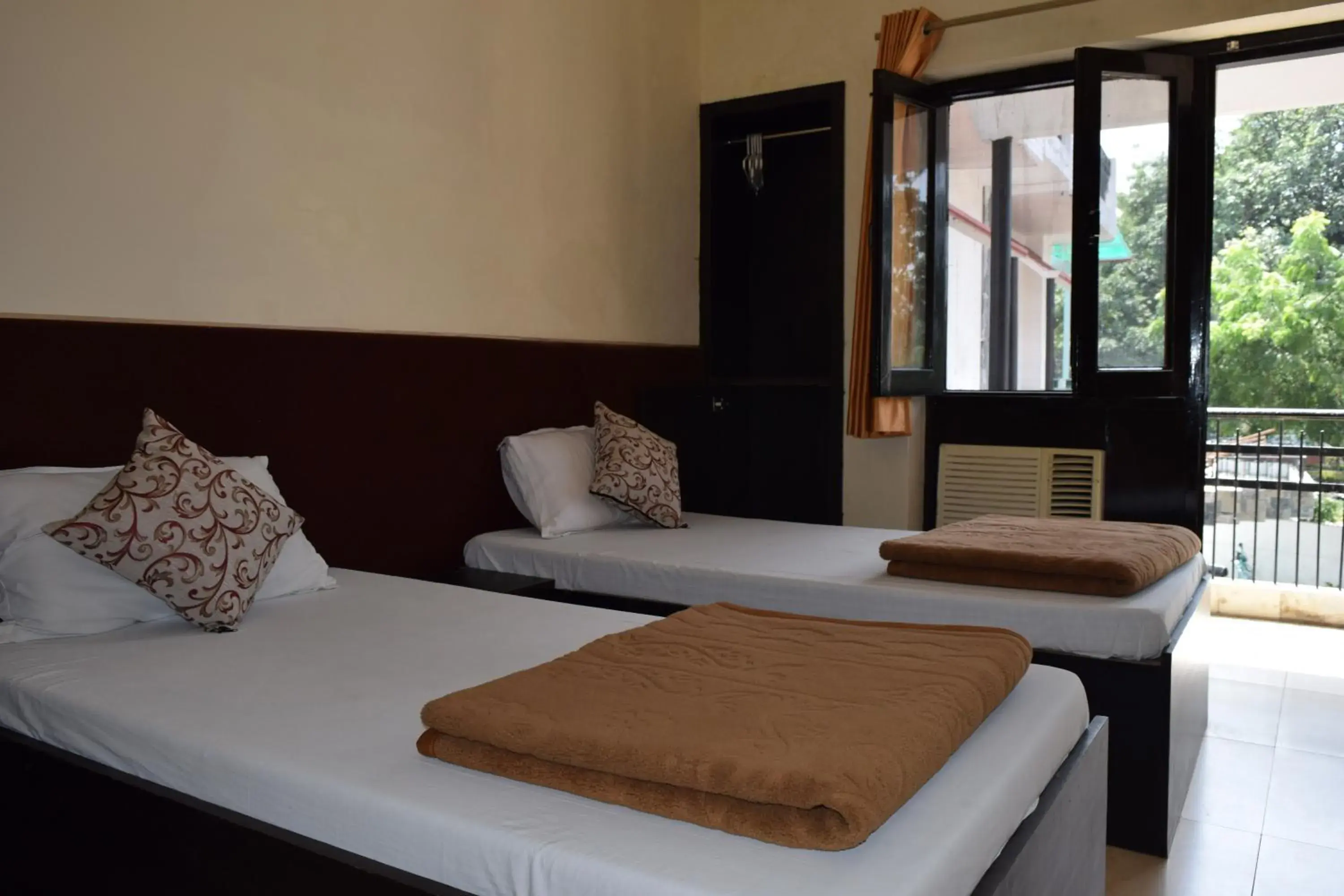 Bed in Hotel Moksha (Previously Raj Deep)