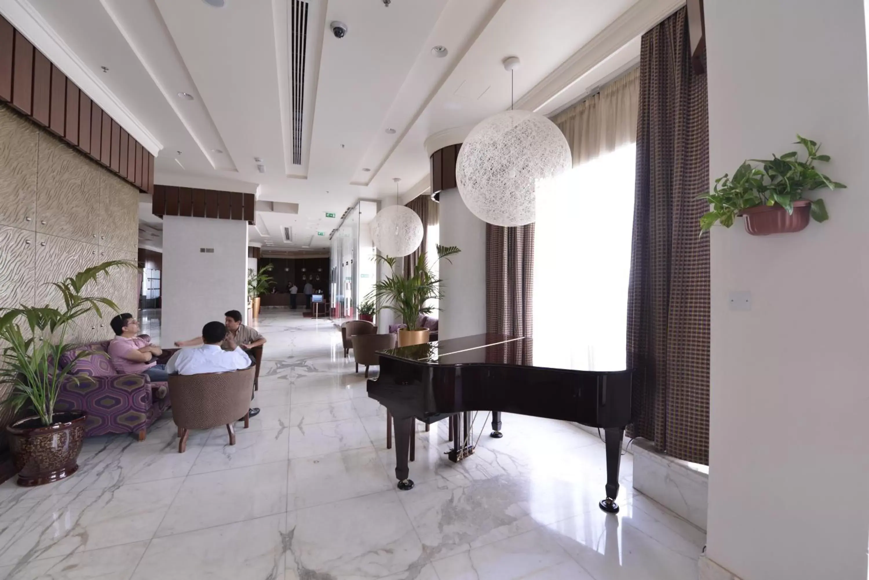 Lobby or reception in City Seasons Al Hamra Hotel
