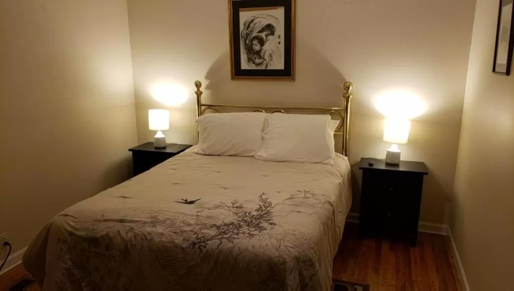 Property building, Bed in Come As You Are Inn LLC