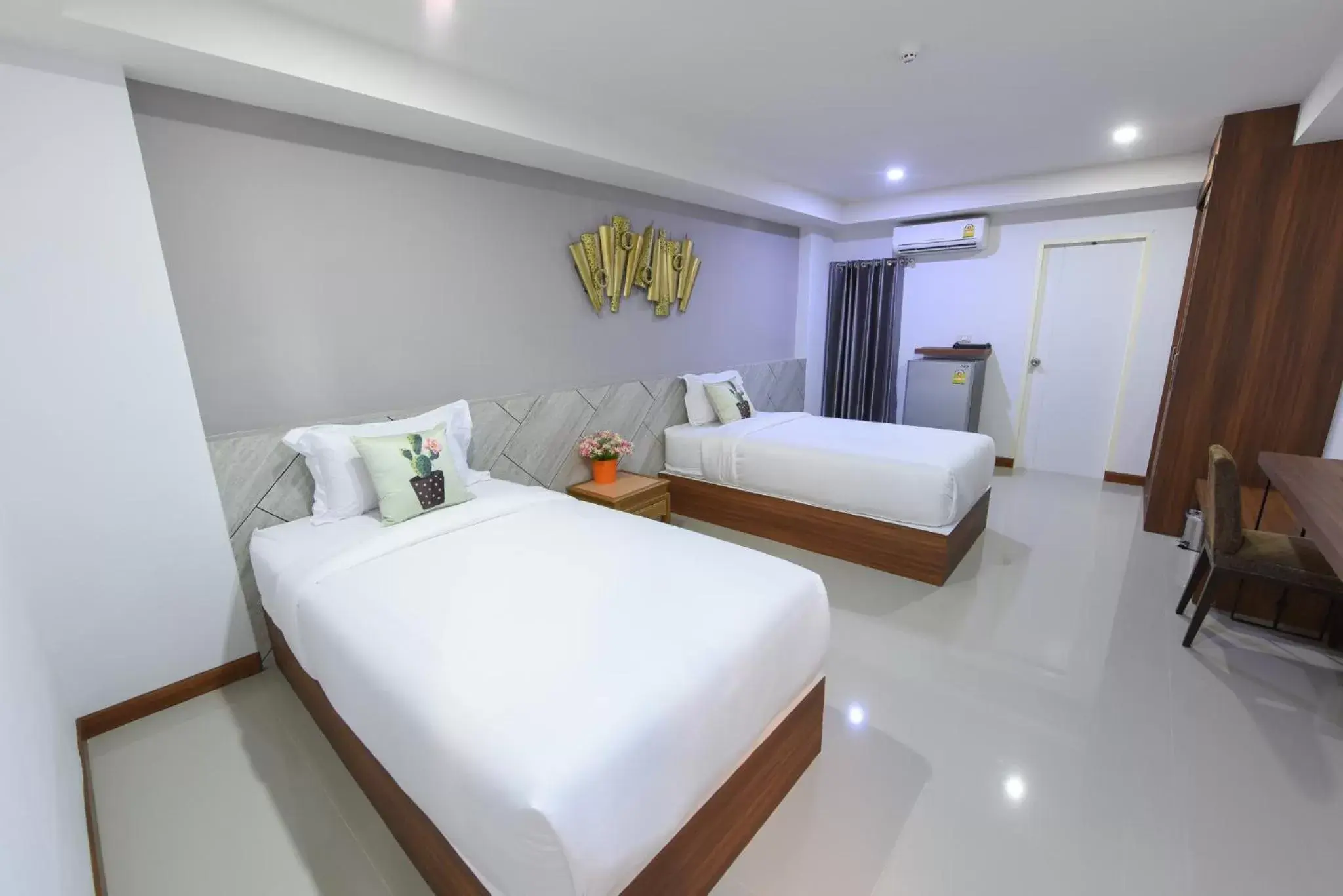 Bed in Wish Hotel Ubon