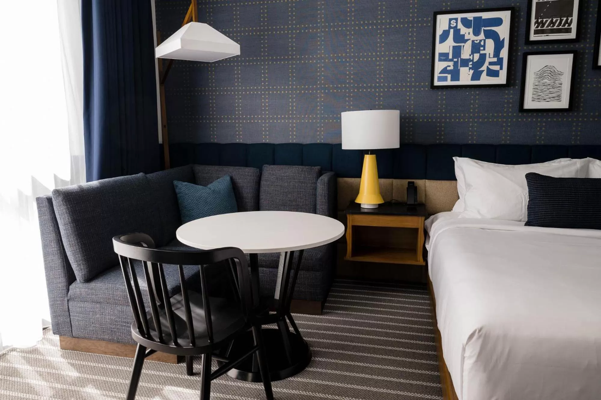 Seating area, Bed in Cambria Hotel Boston Somerville