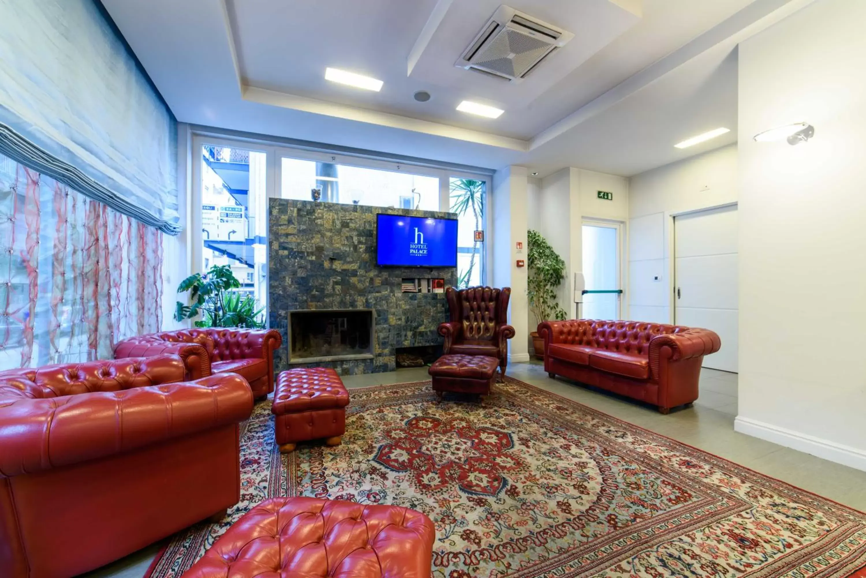 Communal lounge/ TV room, Seating Area in Hotel Palace