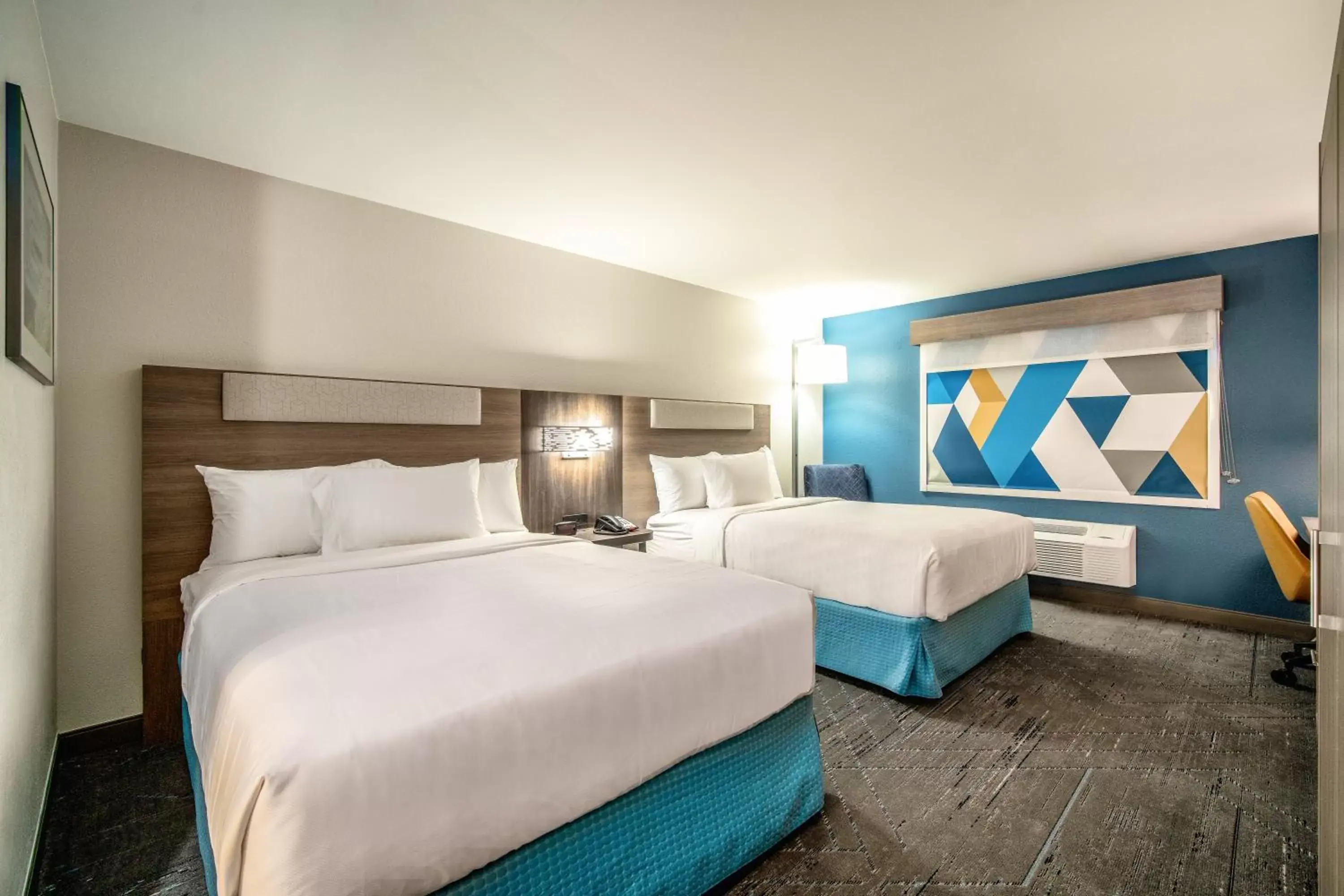 Bed in Holiday Inn Express & Suites Phoenix - Mesa West, an IHG Hotel
