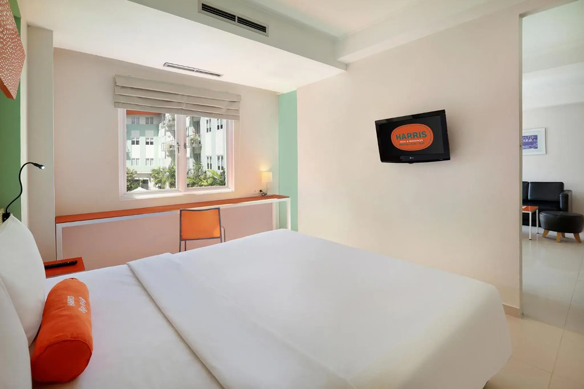 TV and multimedia, Bed in HOTEL and RESIDENCES Riverview Kuta - Bali (Associated HARRIS)