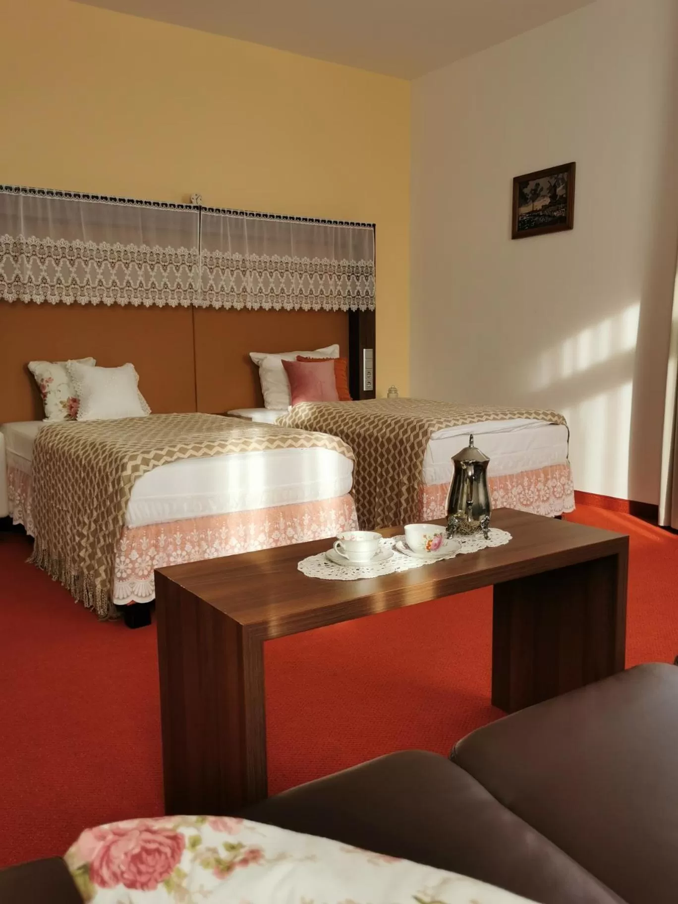 Bed in Tante ALMA's Mannheimer Hotel